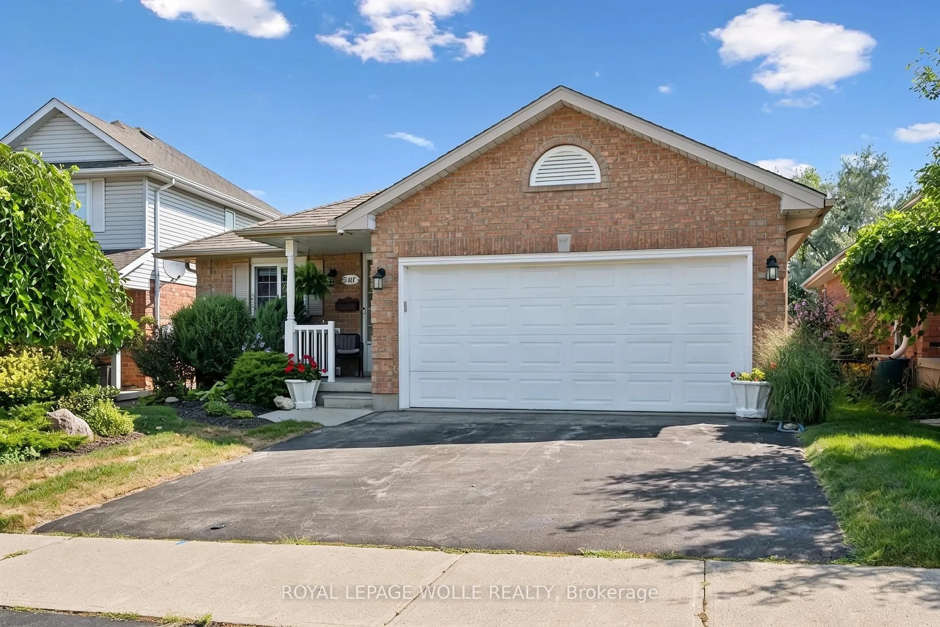 Home with brick exterior material, street for 187 WESTCHESTER Dr, Waterloo Ontario N2B 3M8