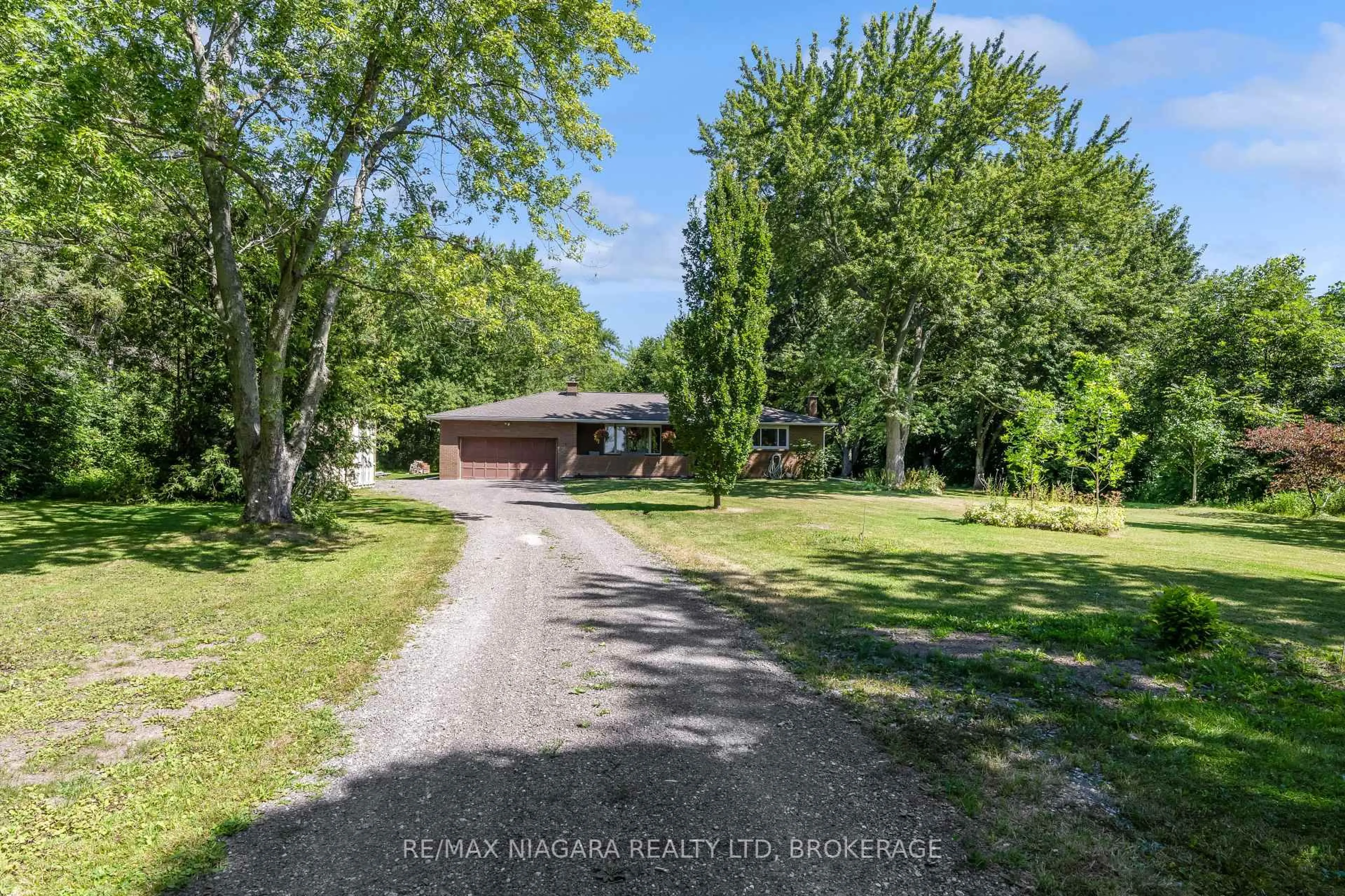 A pic from outside/outdoor area/front of a property/back of a property/a pic from drone, street for 52242 Willford Rd, Wainfleet Ontario L0S 1V0
