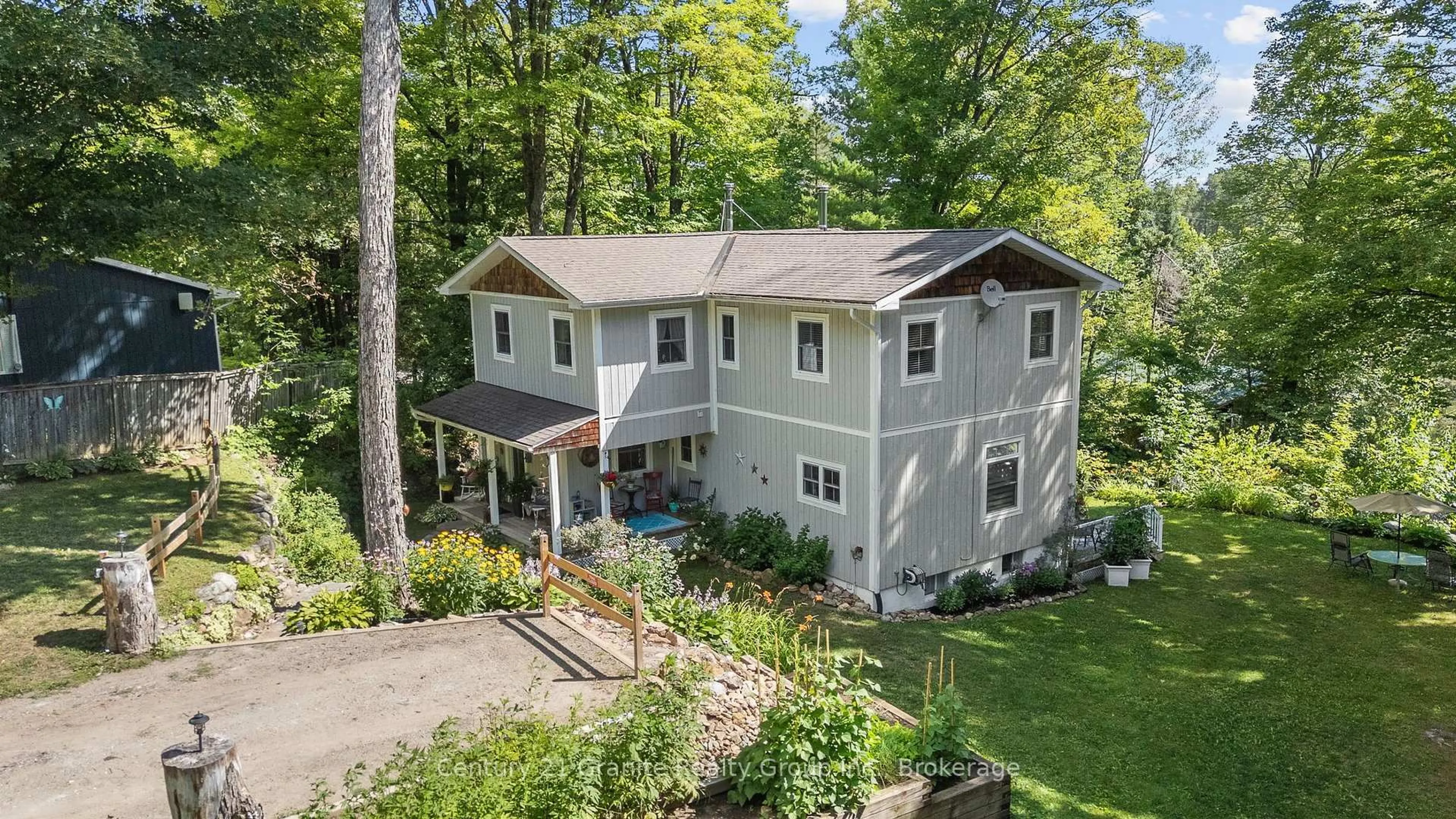 A pic from outside/outdoor area/front of a property/back of a property/a pic from drone, unknown for 1013 Neilburg Dr, Highlands East Ontario K0L 3C0
