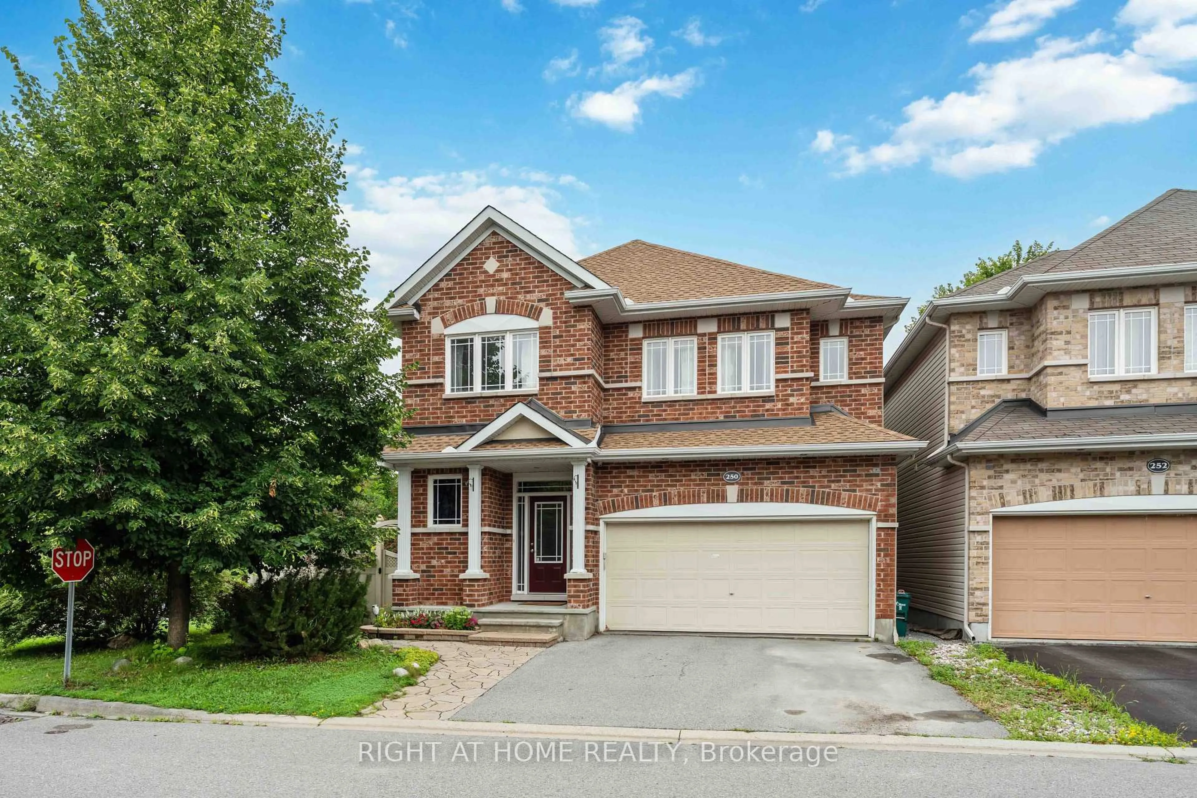 Home with brick exterior material, street for 250 Tofino Private, Kanata Ontario K2M 0B1