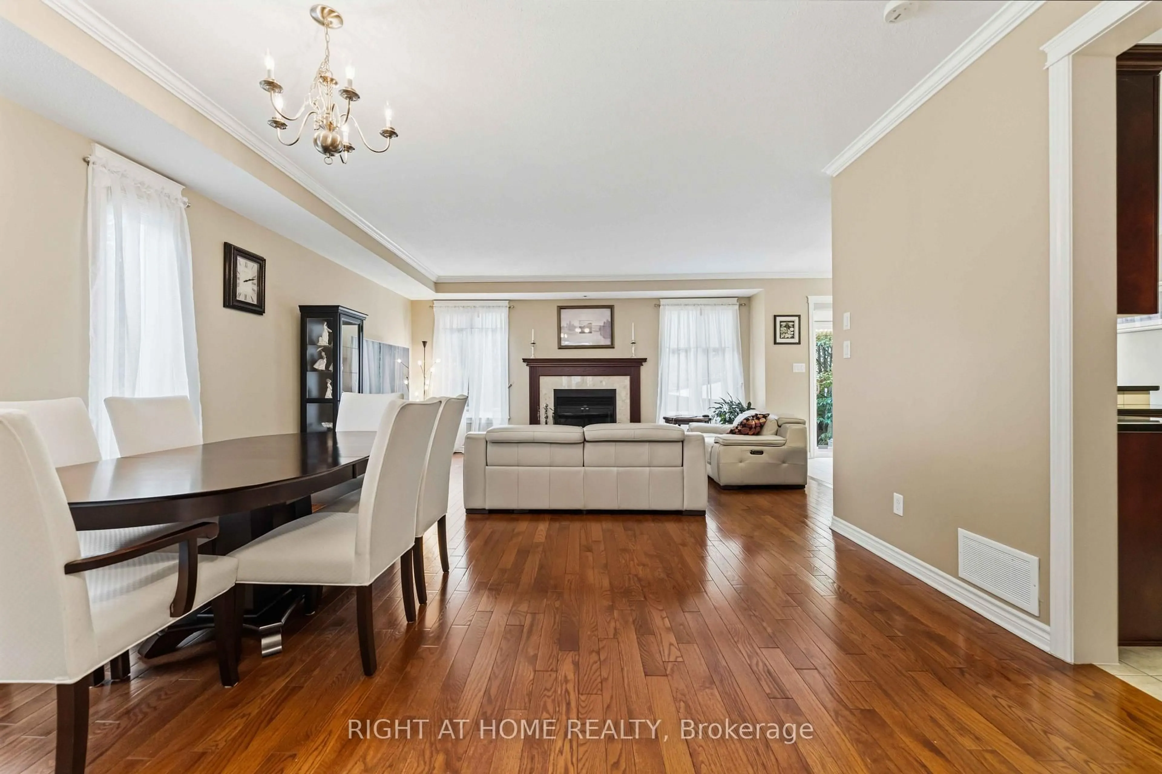 Living room with furniture, wood/laminate floor for 250 Tofino Private, Kanata Ontario K2M 0B1