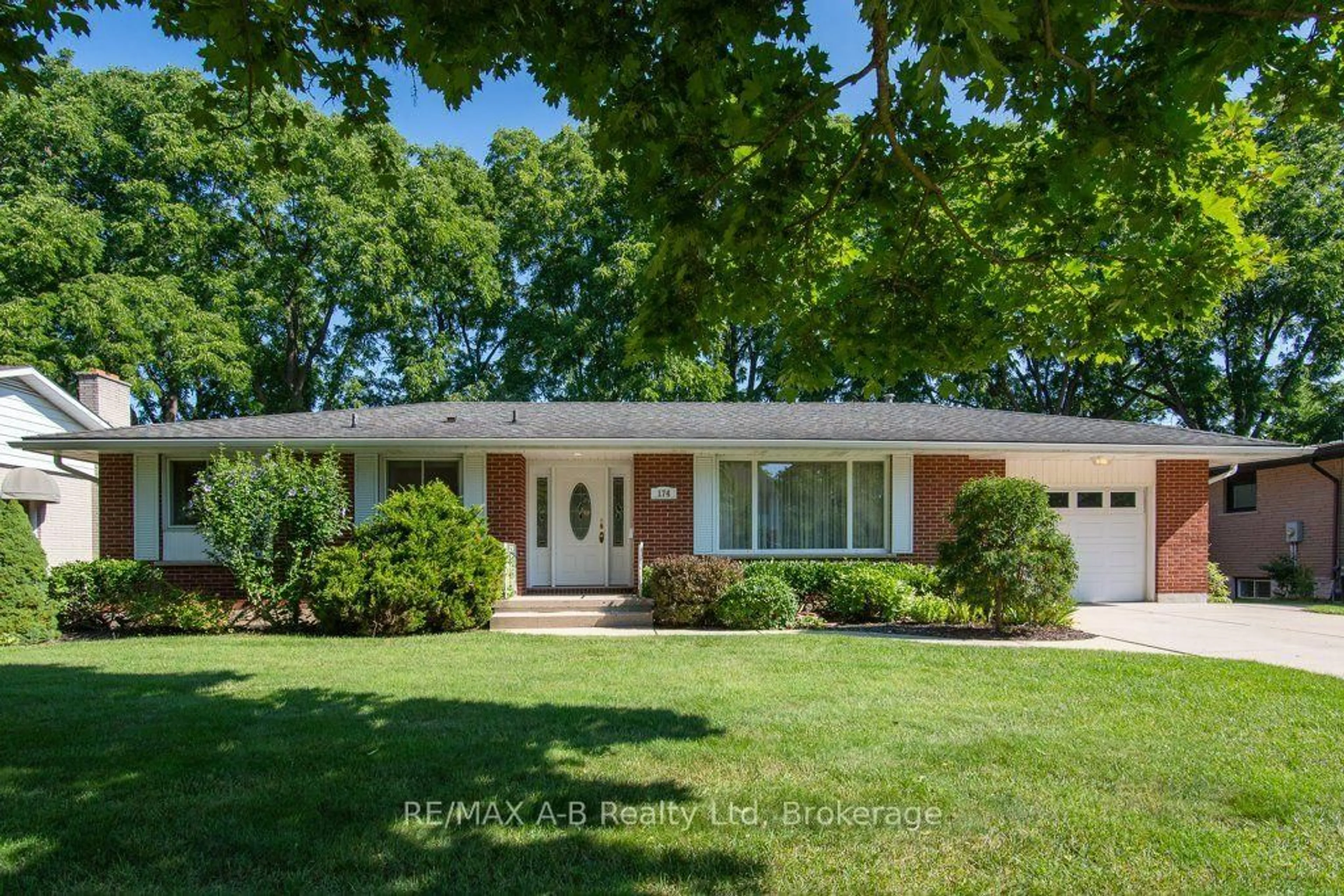 Home with brick exterior material, street for 174 Neal Ave, Stratford Ontario N5A 5A8