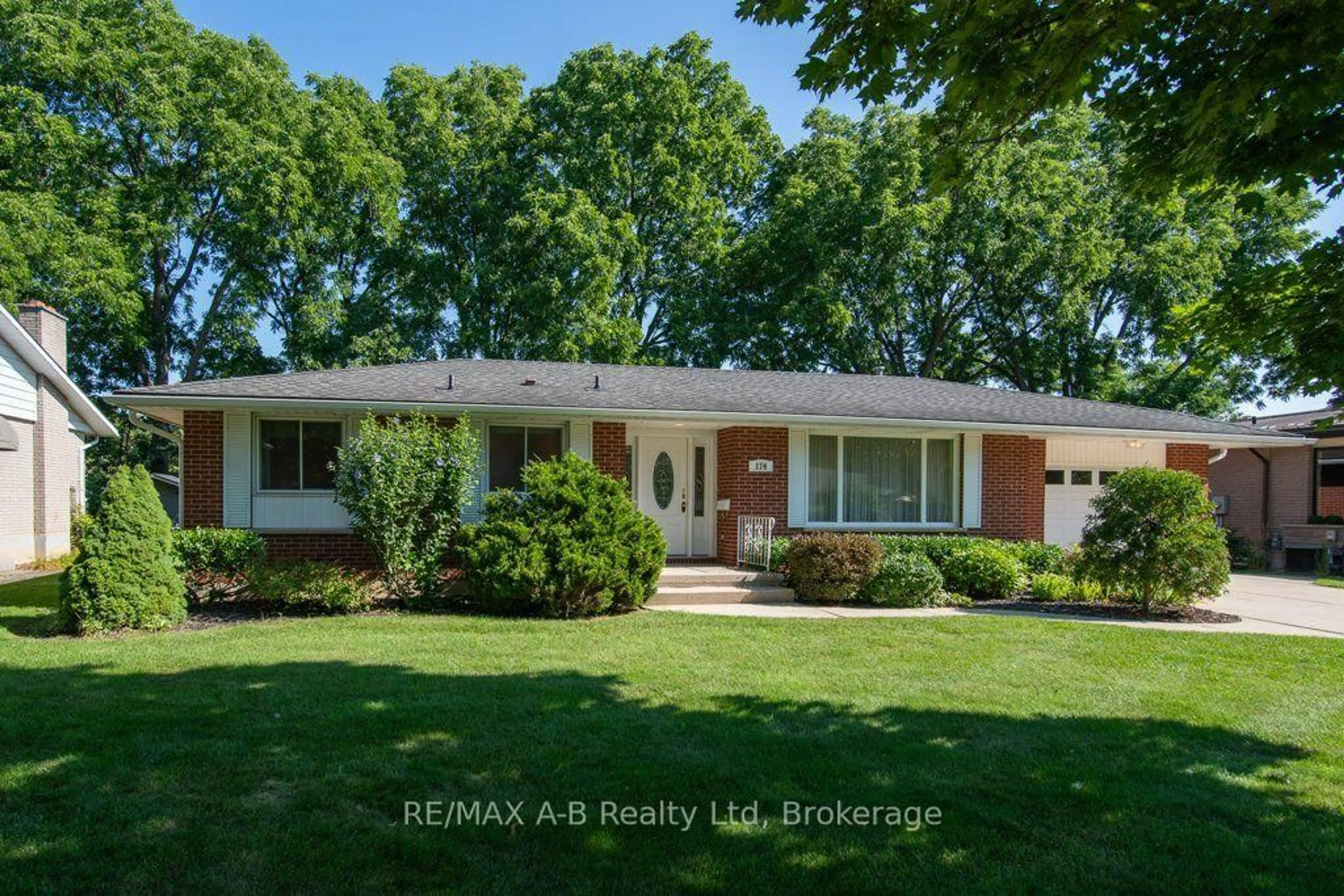 Home with brick exterior material, street for 174 Neal Ave, Stratford Ontario N5A 5A8