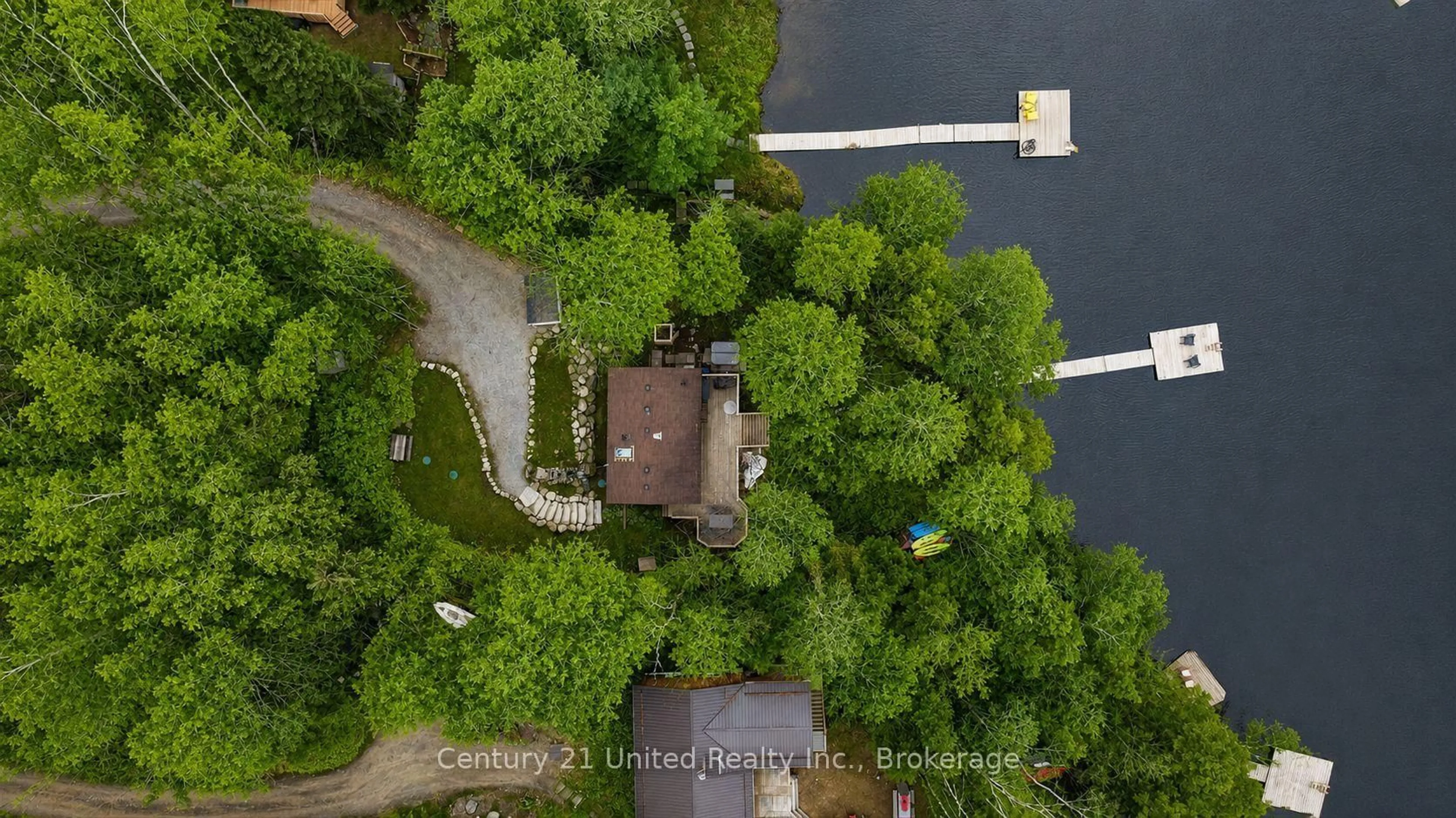 A pic from outside/outdoor area/front of a property/back of a property/a pic from drone, water/lake/river/ocean view for 1053 Esson Creek Lane, Highlands East Ontario K0L 3C0