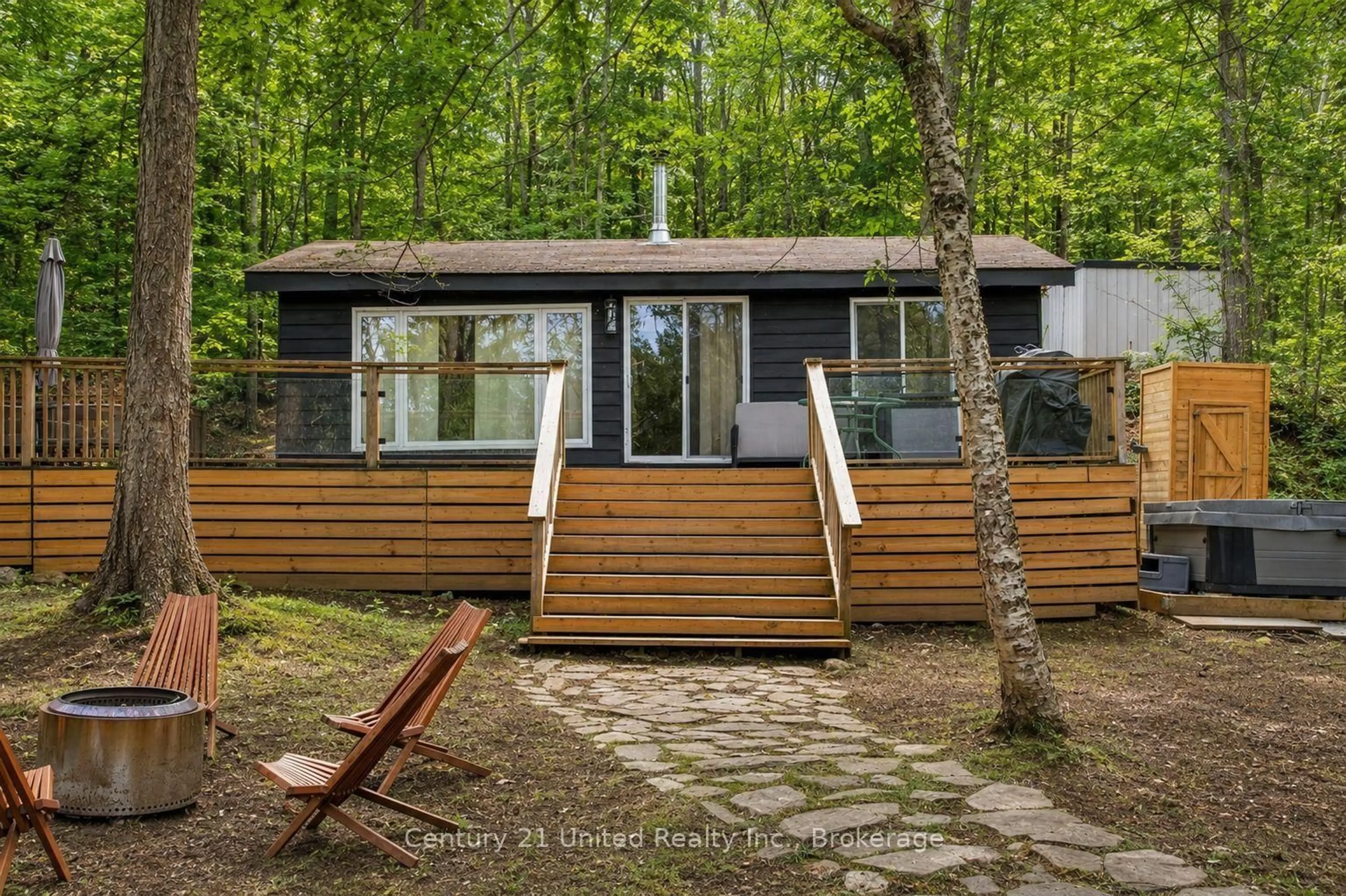 Home with vinyl exterior material, forest/trees view for 1053 Esson Creek Lane, Highlands East Ontario K0L 3C0