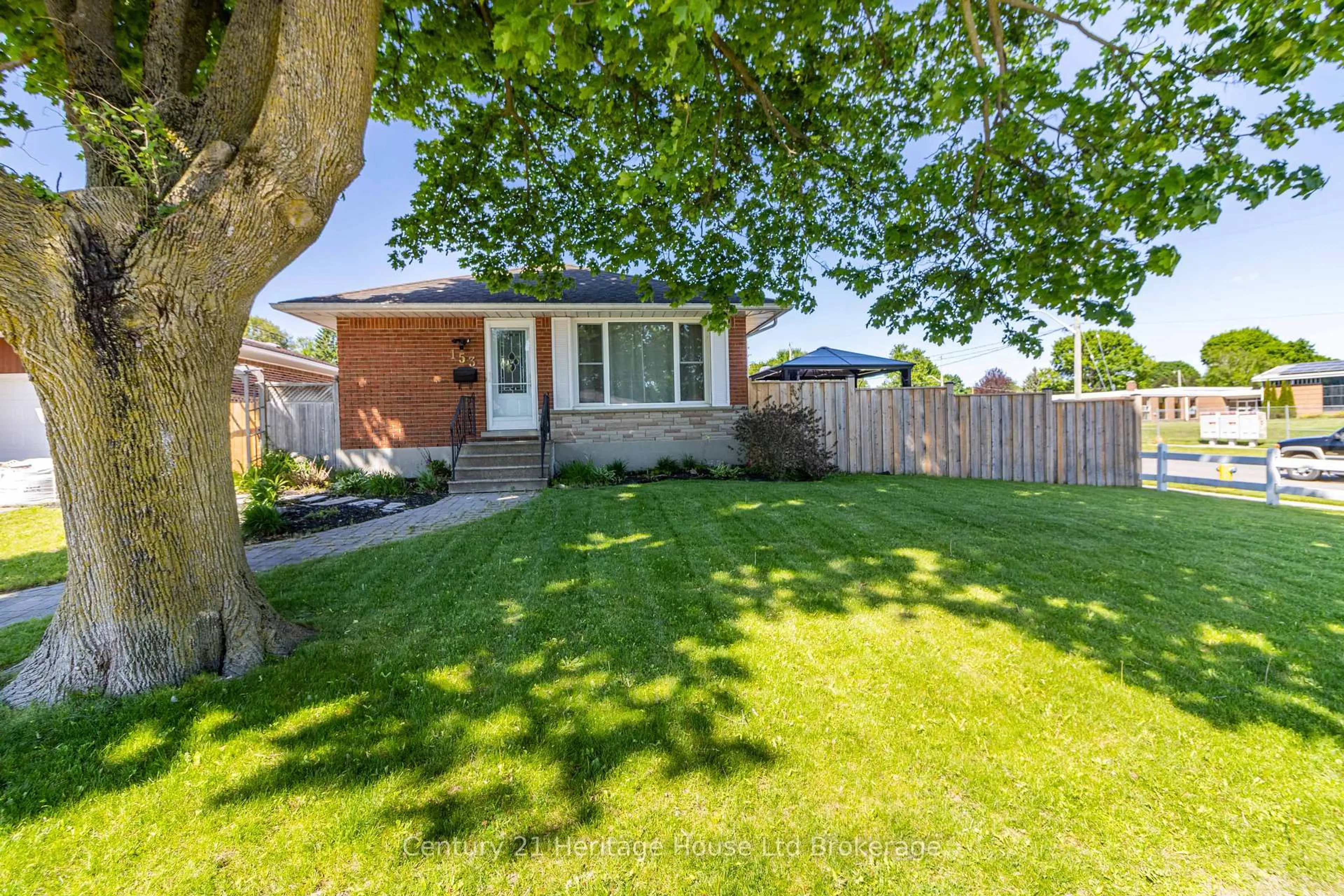 Home with brick exterior material, street for 153 Springbank Ave, Woodstock Ontario N4S 7P9