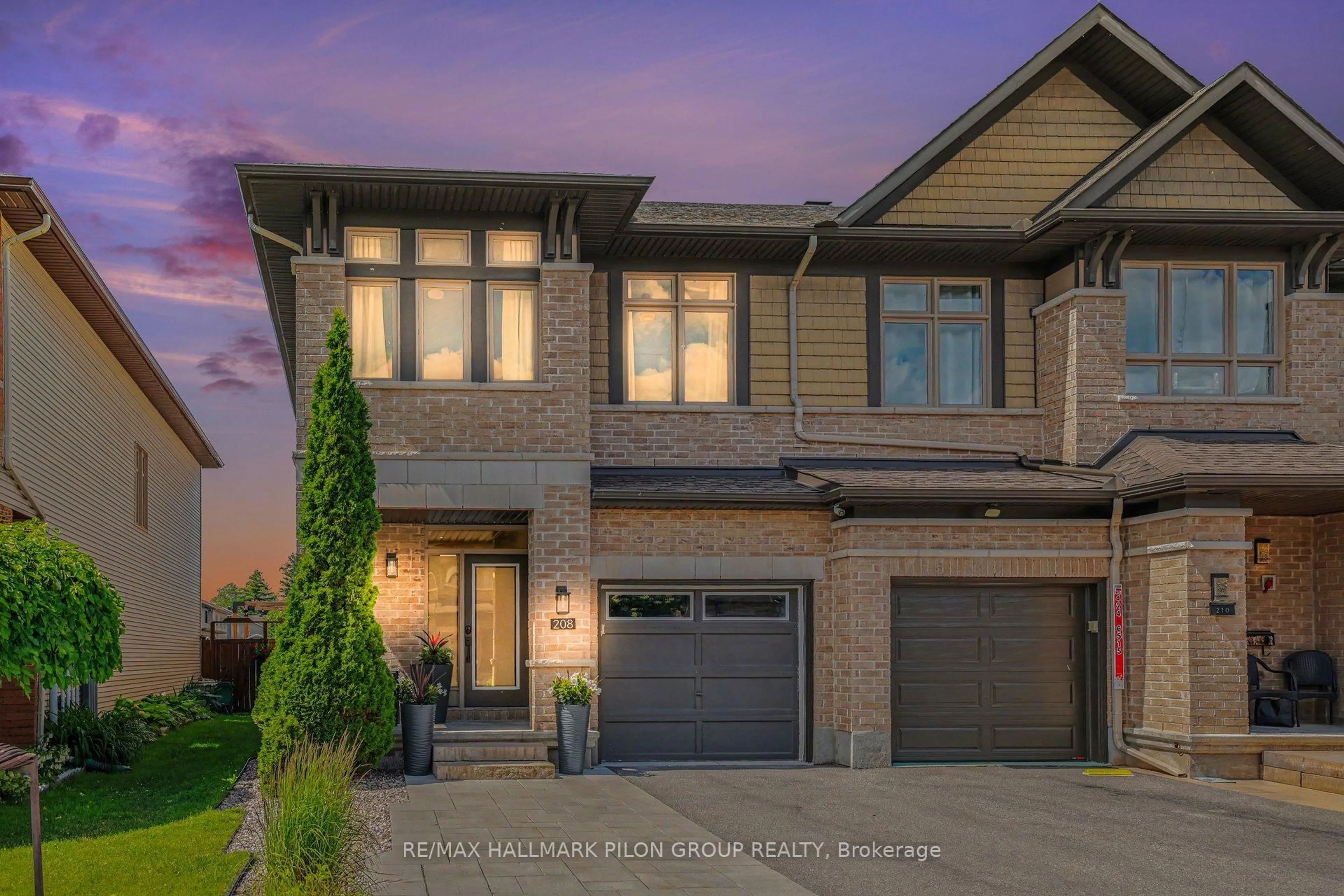 Home with brick exterior material, street for 208 Butterfly Walk, Ottawa Ontario K1W 0G6