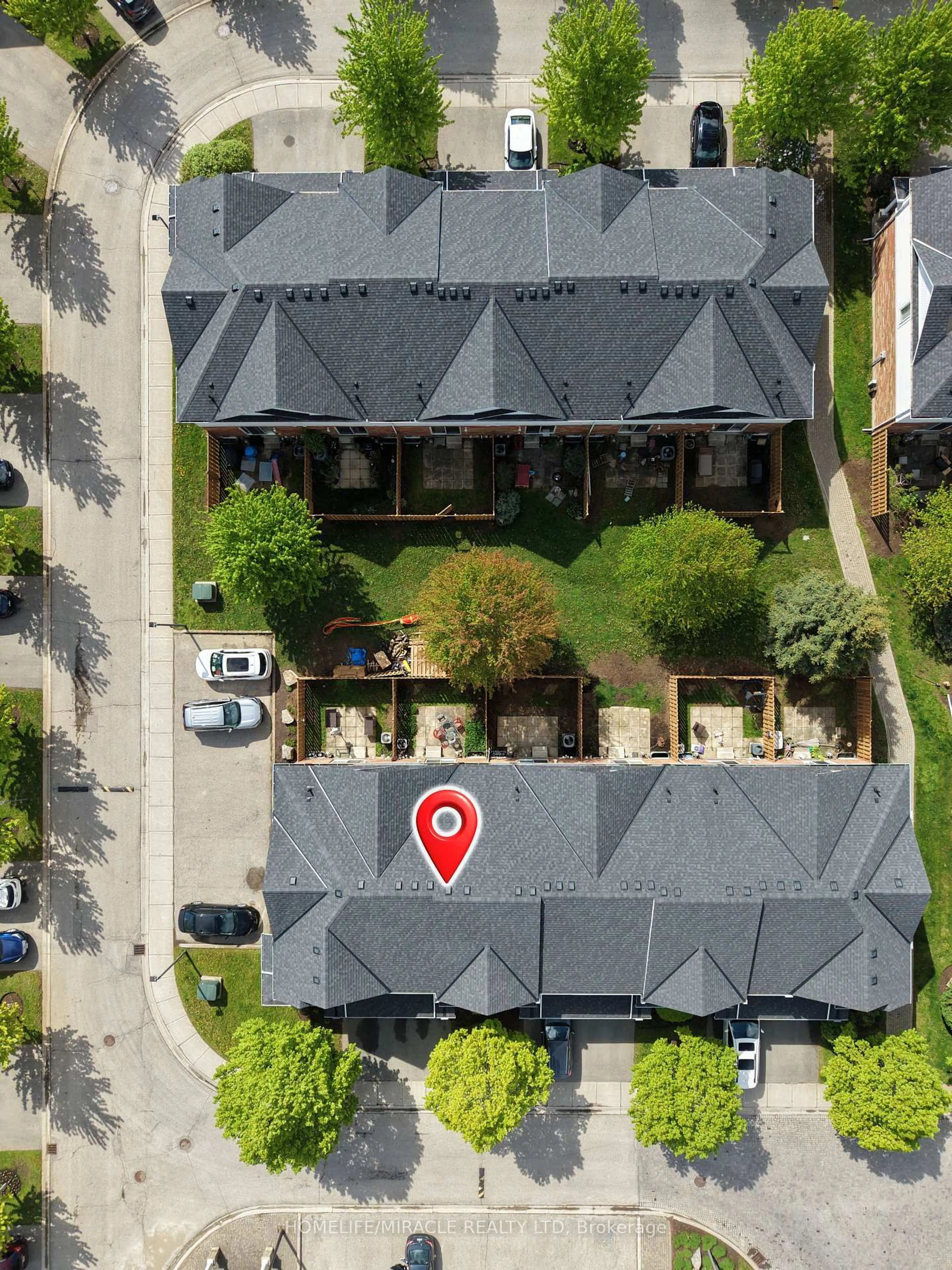 A pic from outside/outdoor area/front of a property/back of a property/a pic from drone, street for 151 Clairfields Dr #55, Guelph Ontario N1L 1P5