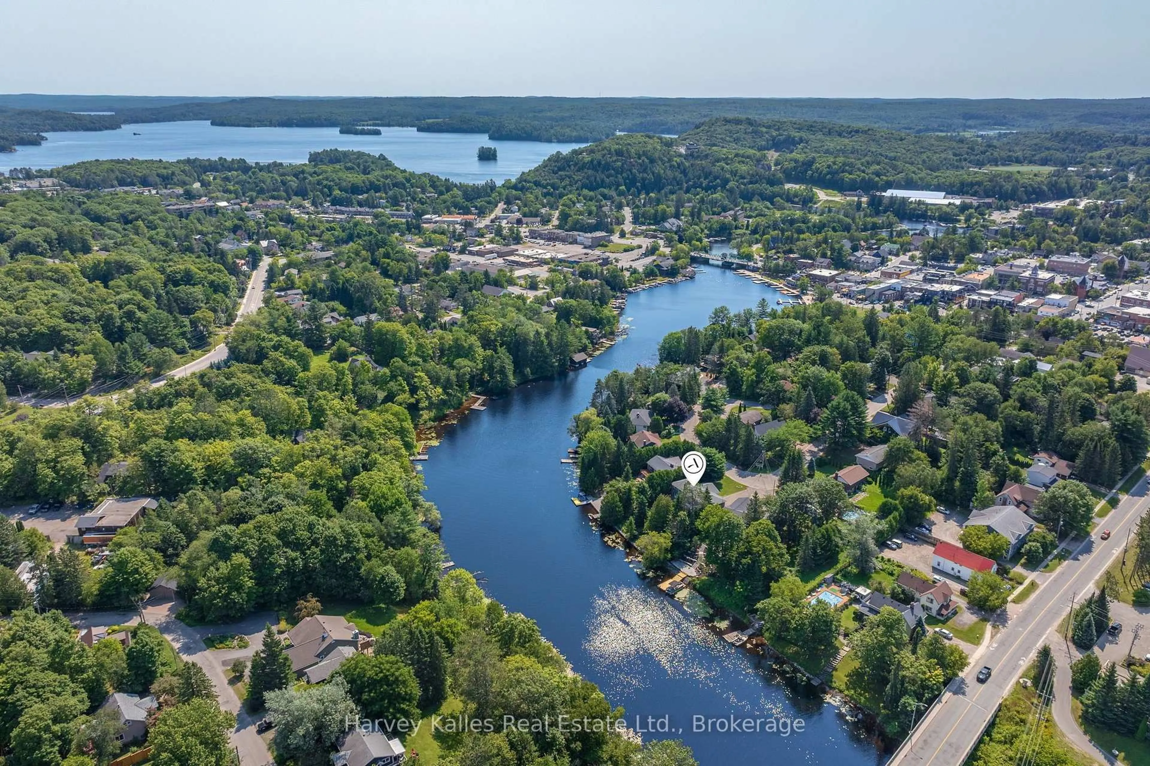 A pic from outside/outdoor area/front of a property/back of a property/a pic from drone, water/lake/river/ocean view for 40 King Cres, Huntsville Ontario P1H 1X6