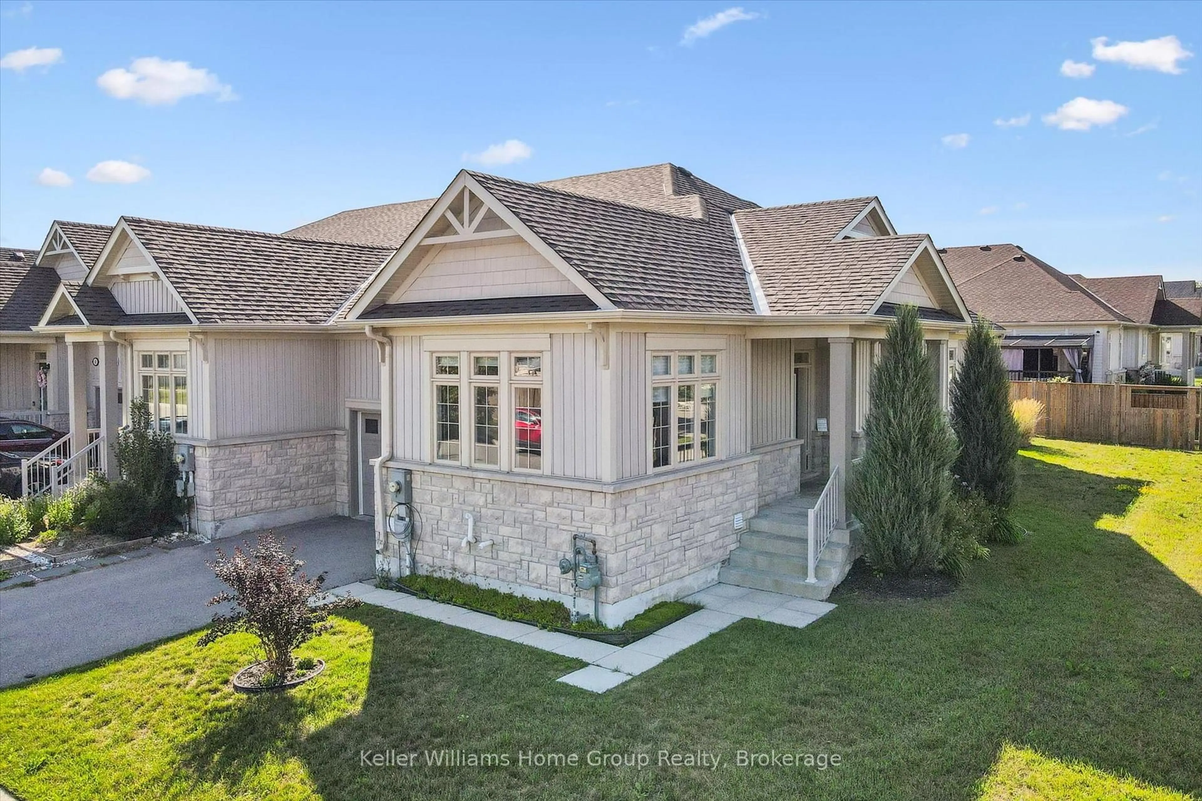 Home with brick exterior material, street for 52 Findlay Way, Centre Wellington Ontario N1M 0G7
