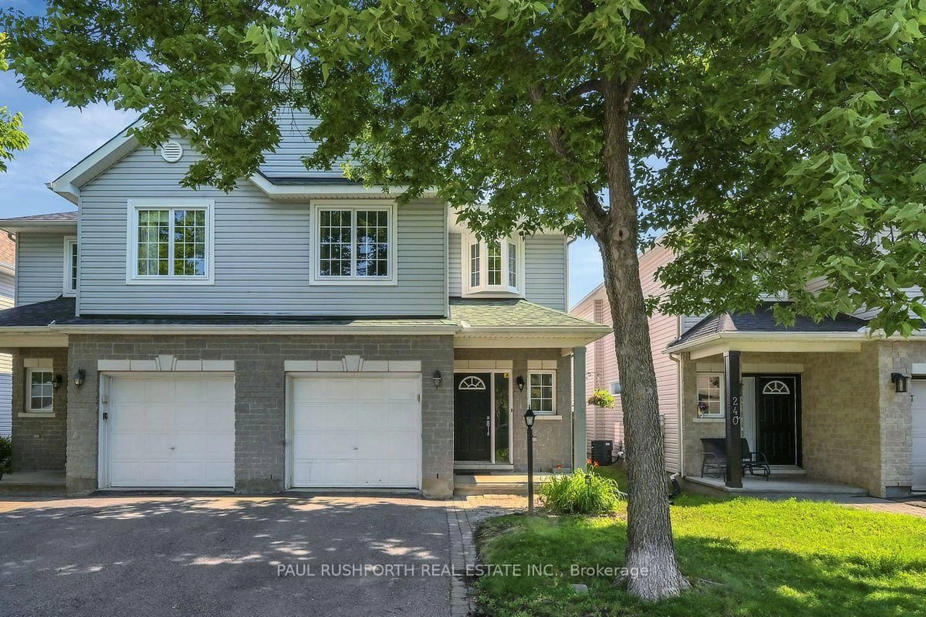 Home with vinyl exterior material, street for 242 Deerfox Dr, Ottawa Ontario K2J 4Z2
