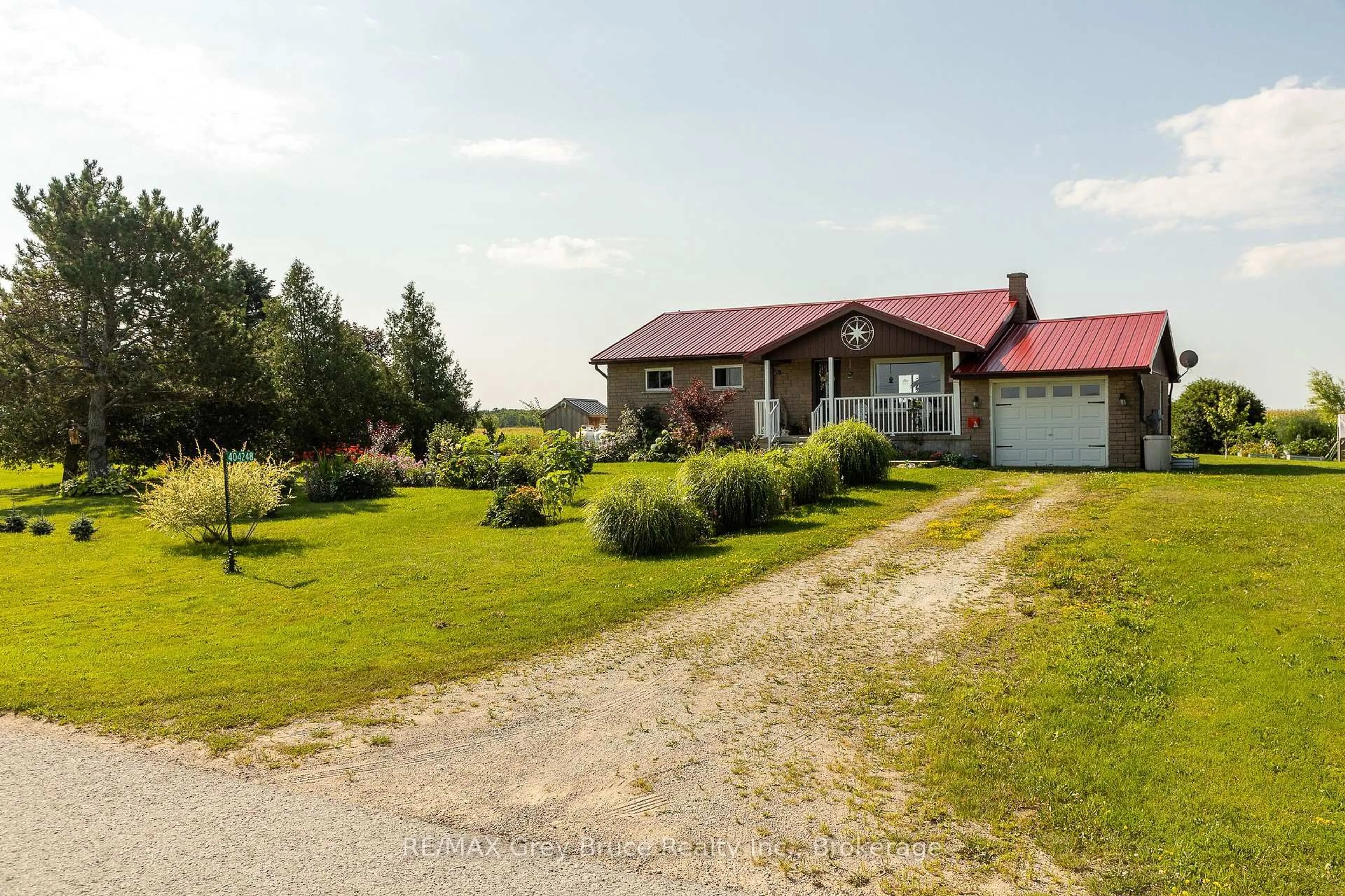 A pic from outside/outdoor area/front of a property/back of a property/a pic from drone, unknown for 404248 CONCESSION 20 Rd, Georgian Bluffs Ontario N0H 1S0