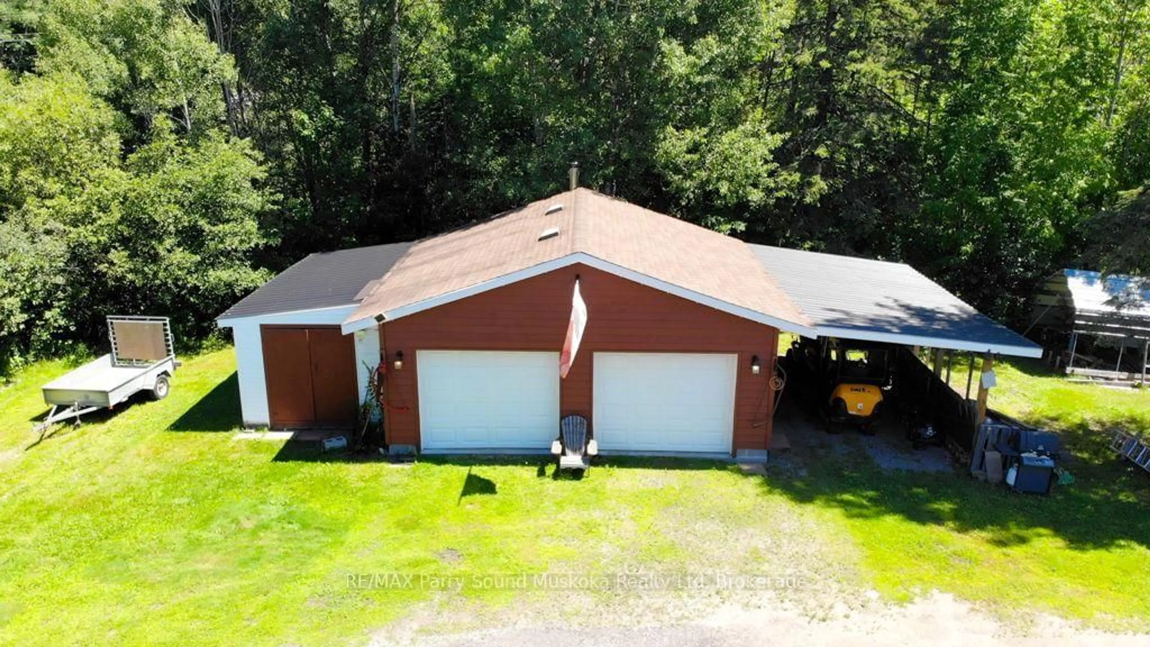 A pic from outside/outdoor area/front of a property/back of a property/a pic from drone, building for 4031 Highway 520 Highway, Magnetawan Ontario P0A 1C0