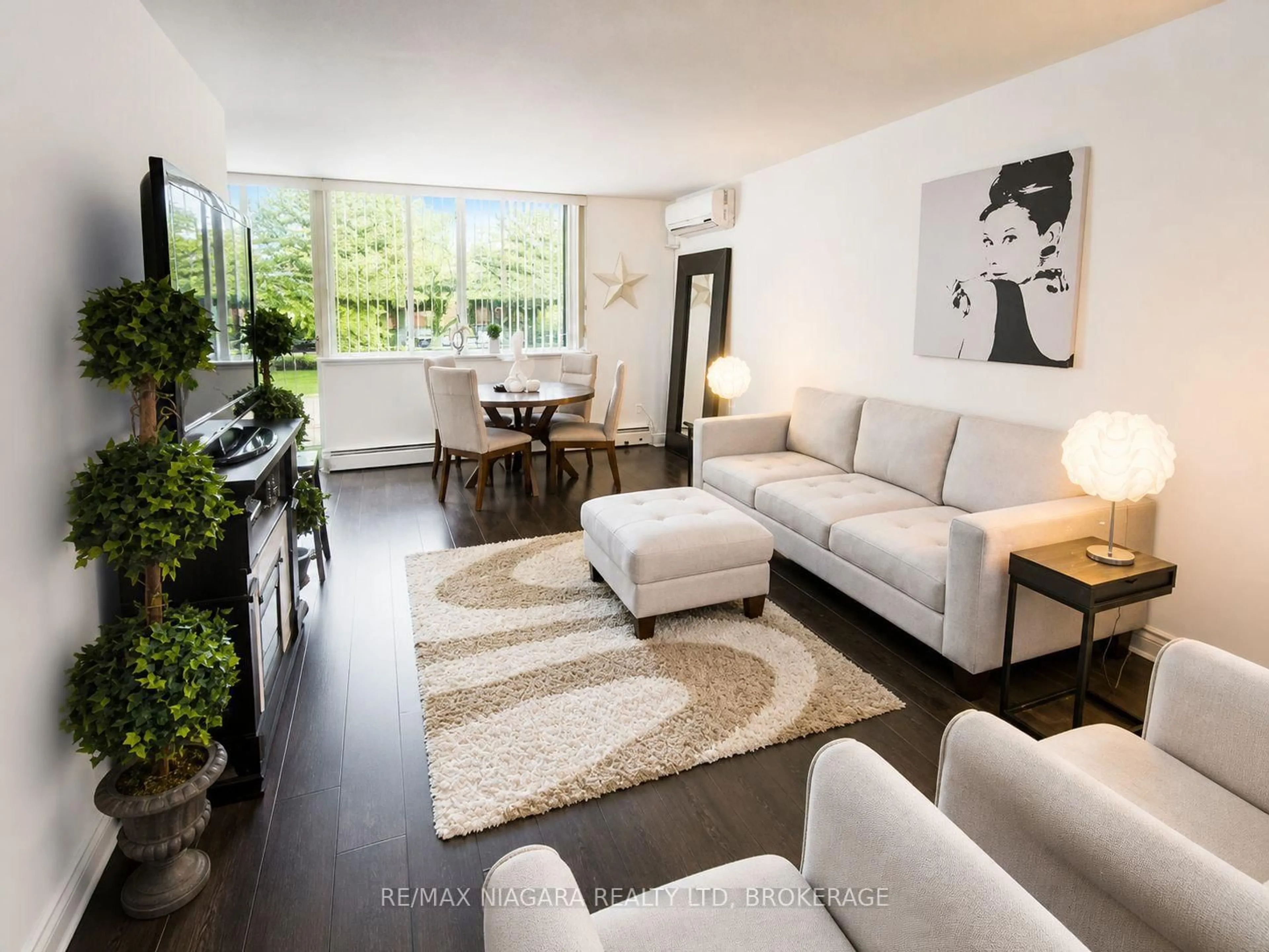 Living room with furniture, unknown for 6390 Huggins St #205, Niagara Falls Ontario L2J 1H1