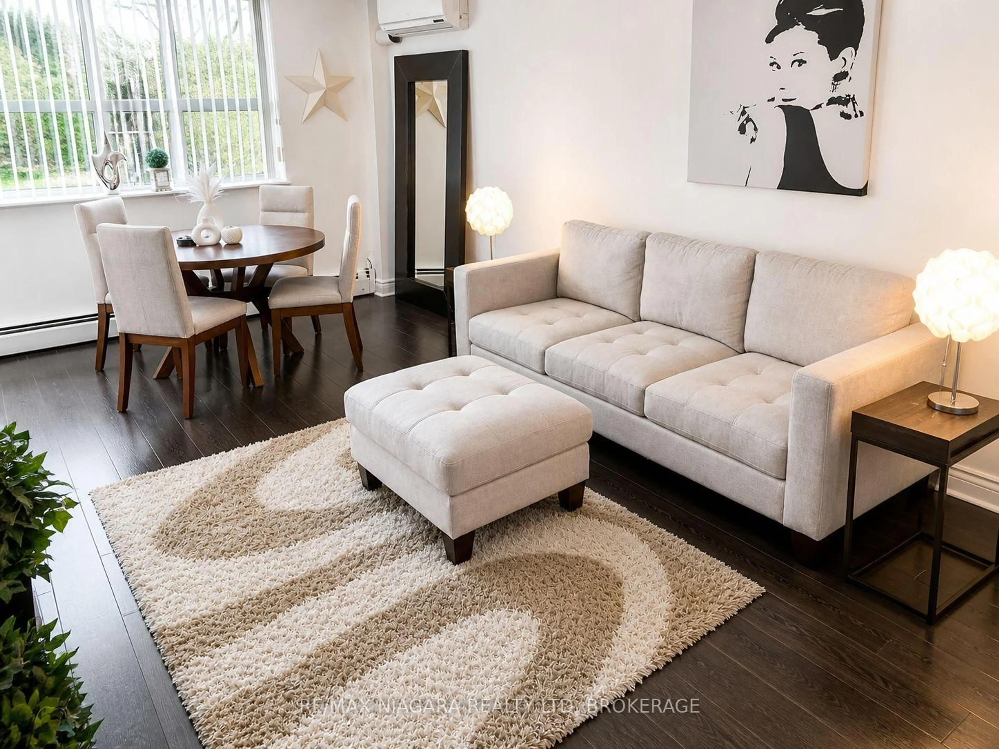 Living room with furniture, unknown for 6390 Huggins St #205, Niagara Falls Ontario L2J 1H1