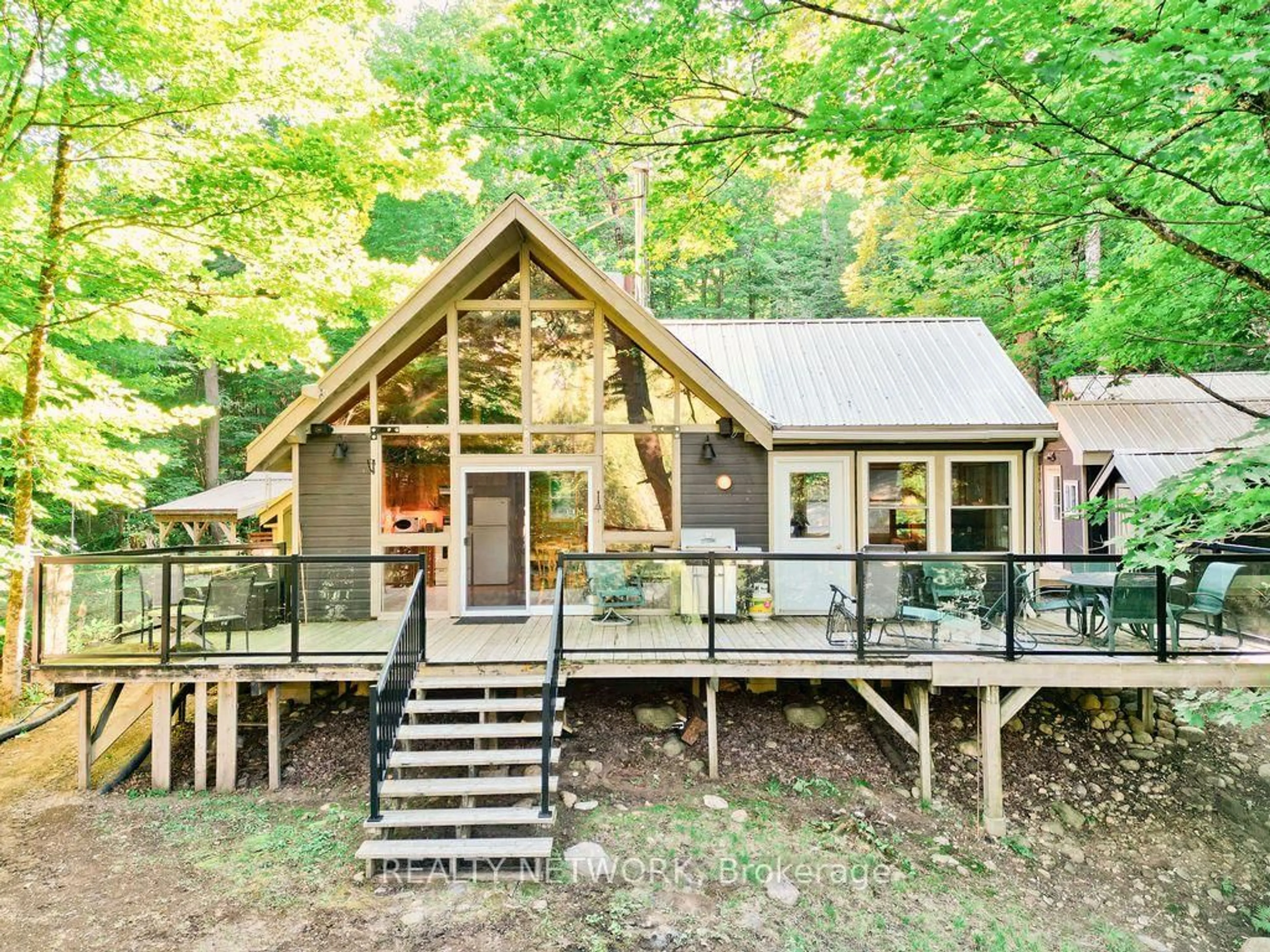 Home with vinyl exterior material, unknown for 1123 Blue Lake Rd, Lake of Bays Ontario P1H 2J6