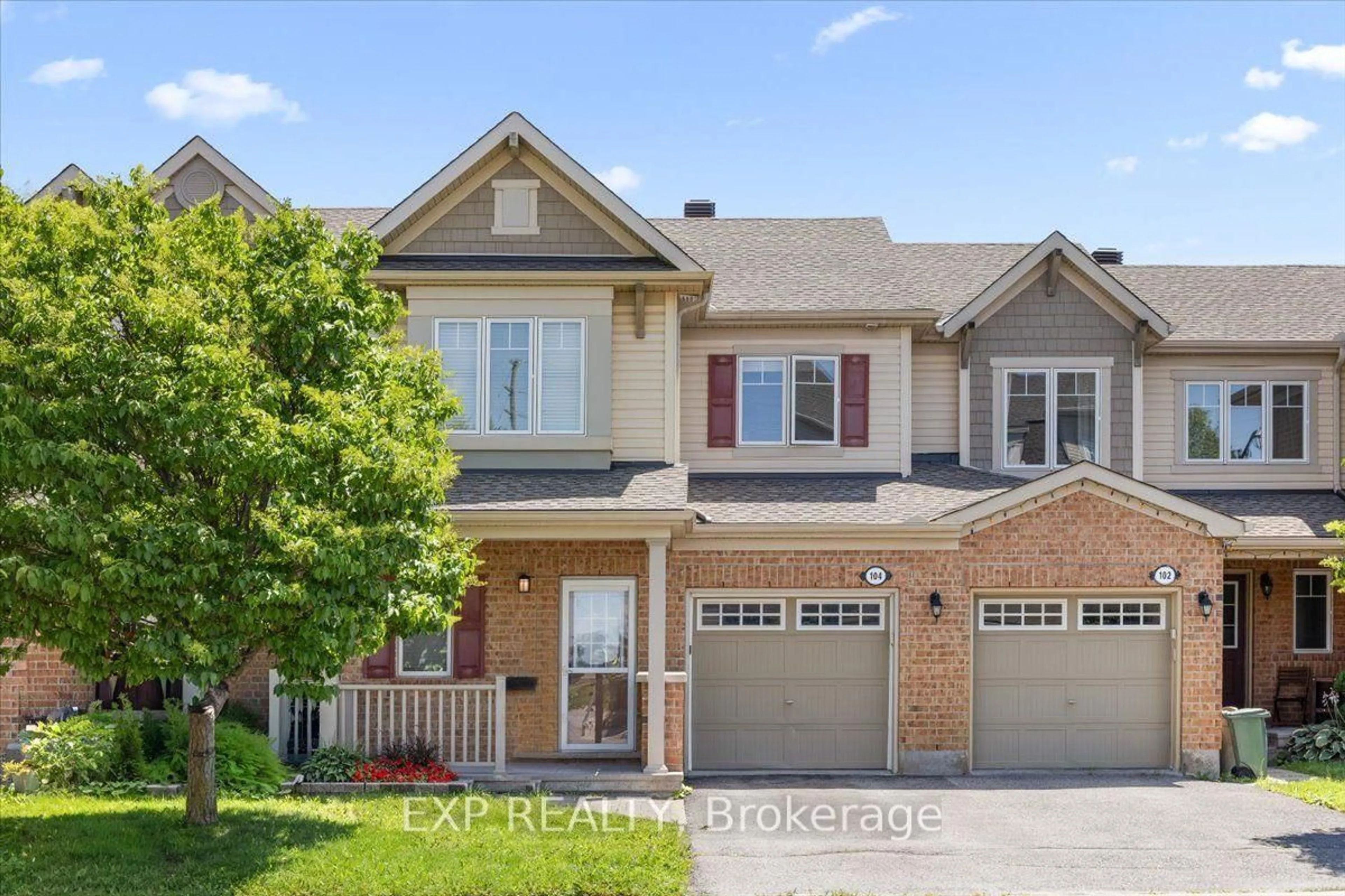 Home with brick exterior material, street for 104 Harmattan Ave, Ottawa Ontario K2S 0E3