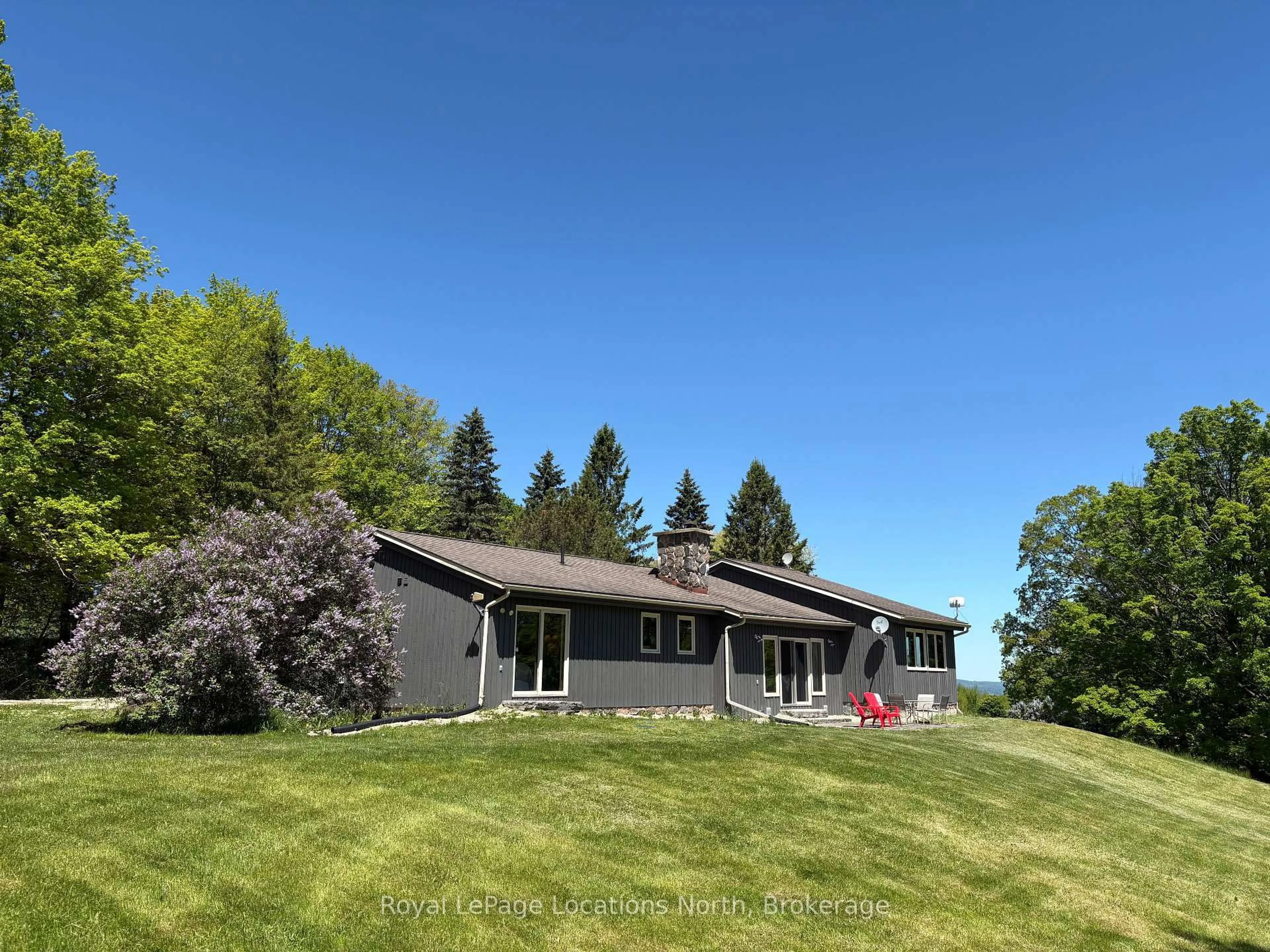 A pic from outside/outdoor area/front of a property/back of a property/a pic from drone, unknown for 446070 Johnston's Sdrd, Grey Highlands Ontario N0C 1E0
