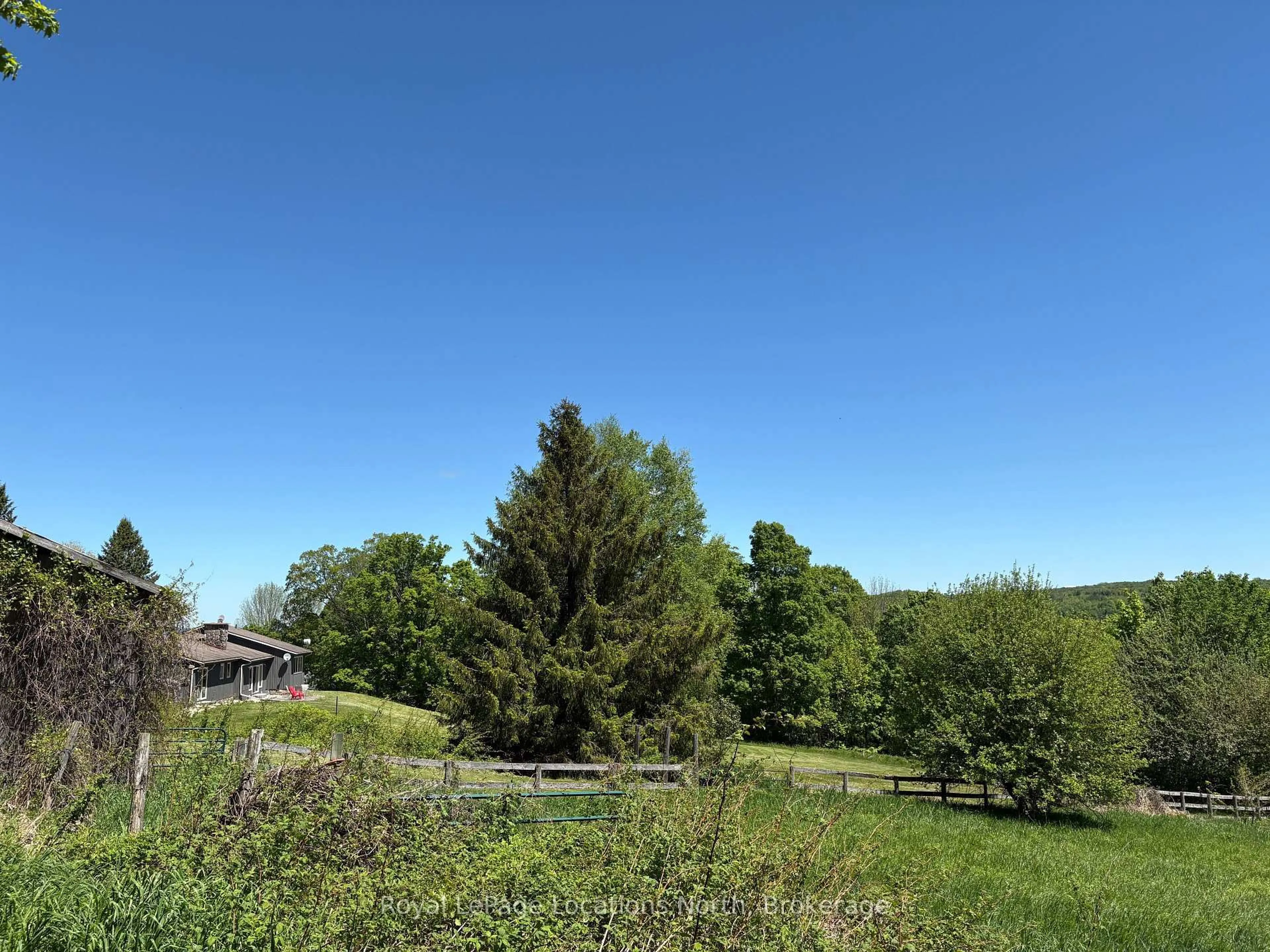 A pic from outside/outdoor area/front of a property/back of a property/a pic from drone, forest/trees view for 446070 Johnston's Sdrd, Grey Highlands Ontario N0C 1E0