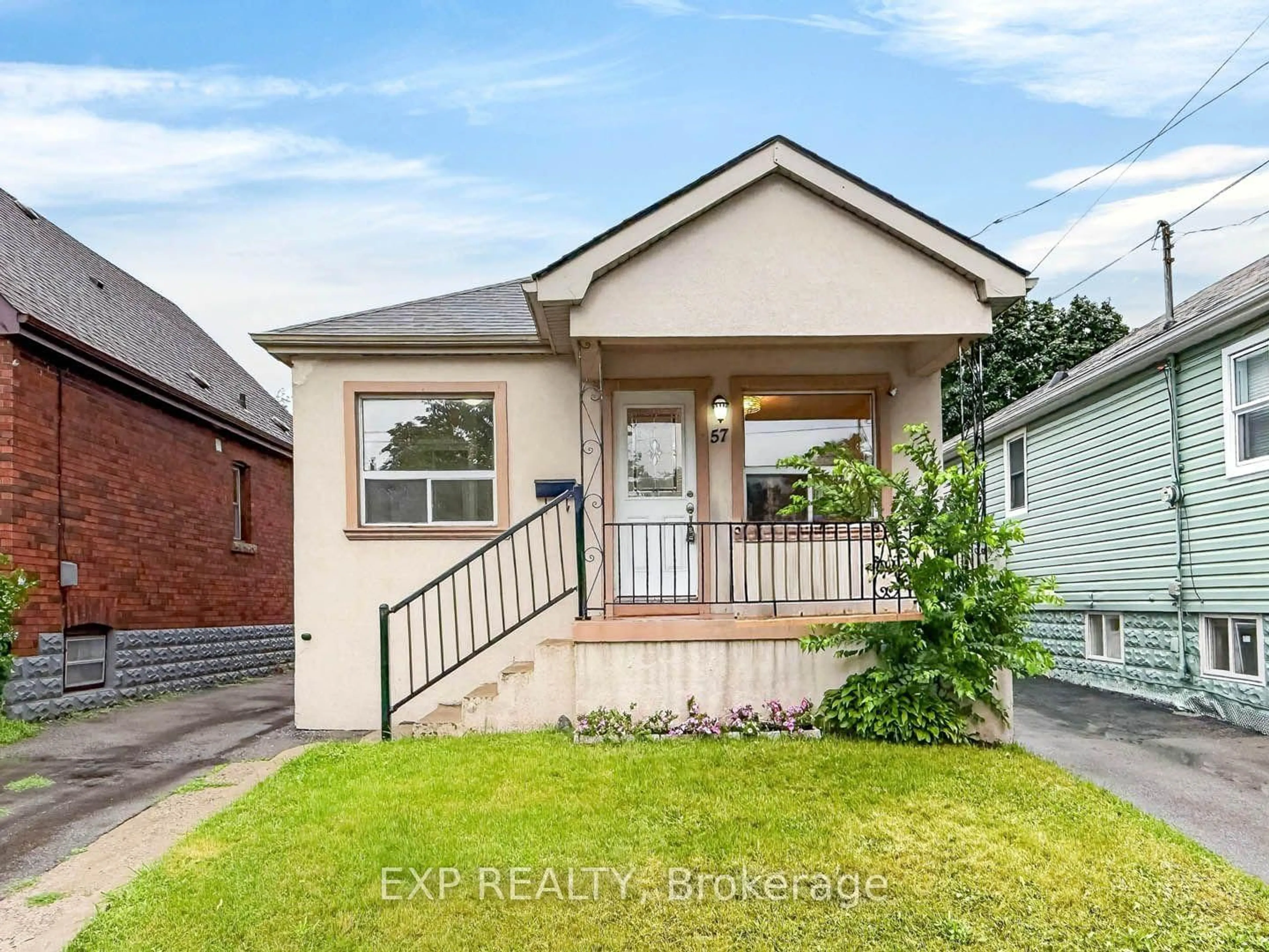 Home with brick exterior material, street for 57 Weir St, Hamilton Ontario L8K 3A3