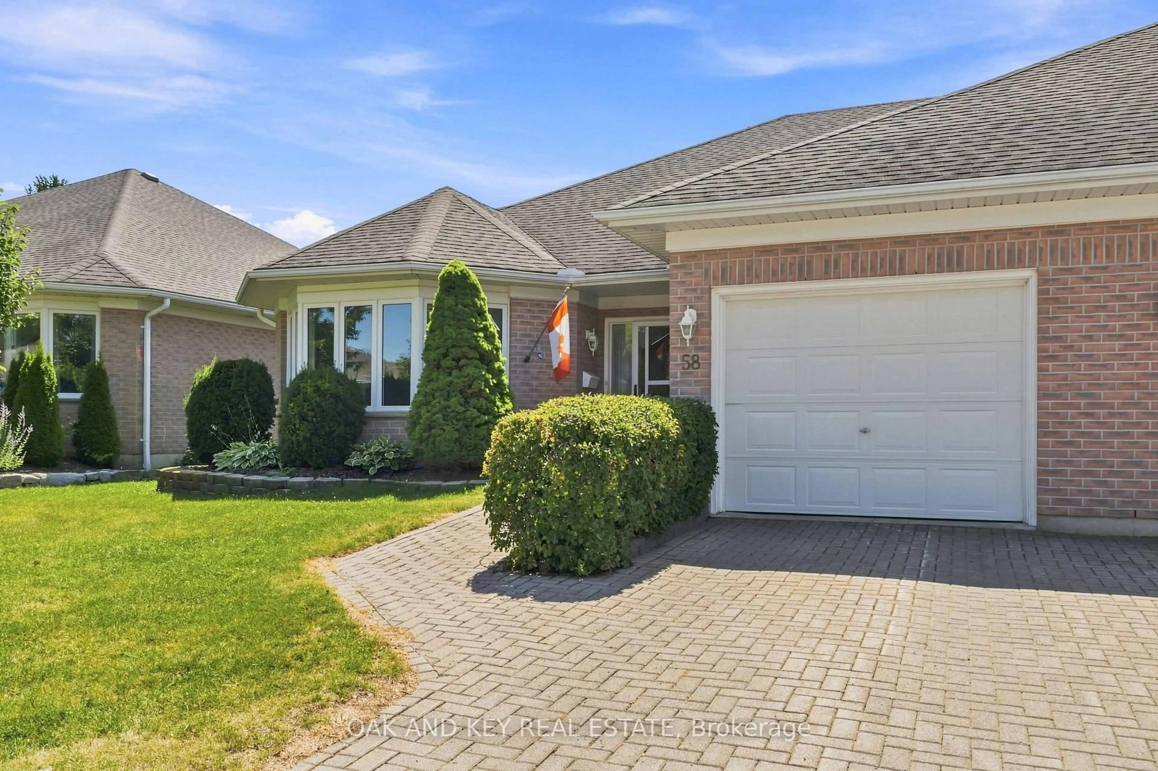 Home with brick exterior material, street for 58 Ilderbrook Circ, Middlesex Centre Ontario N0M 2A0