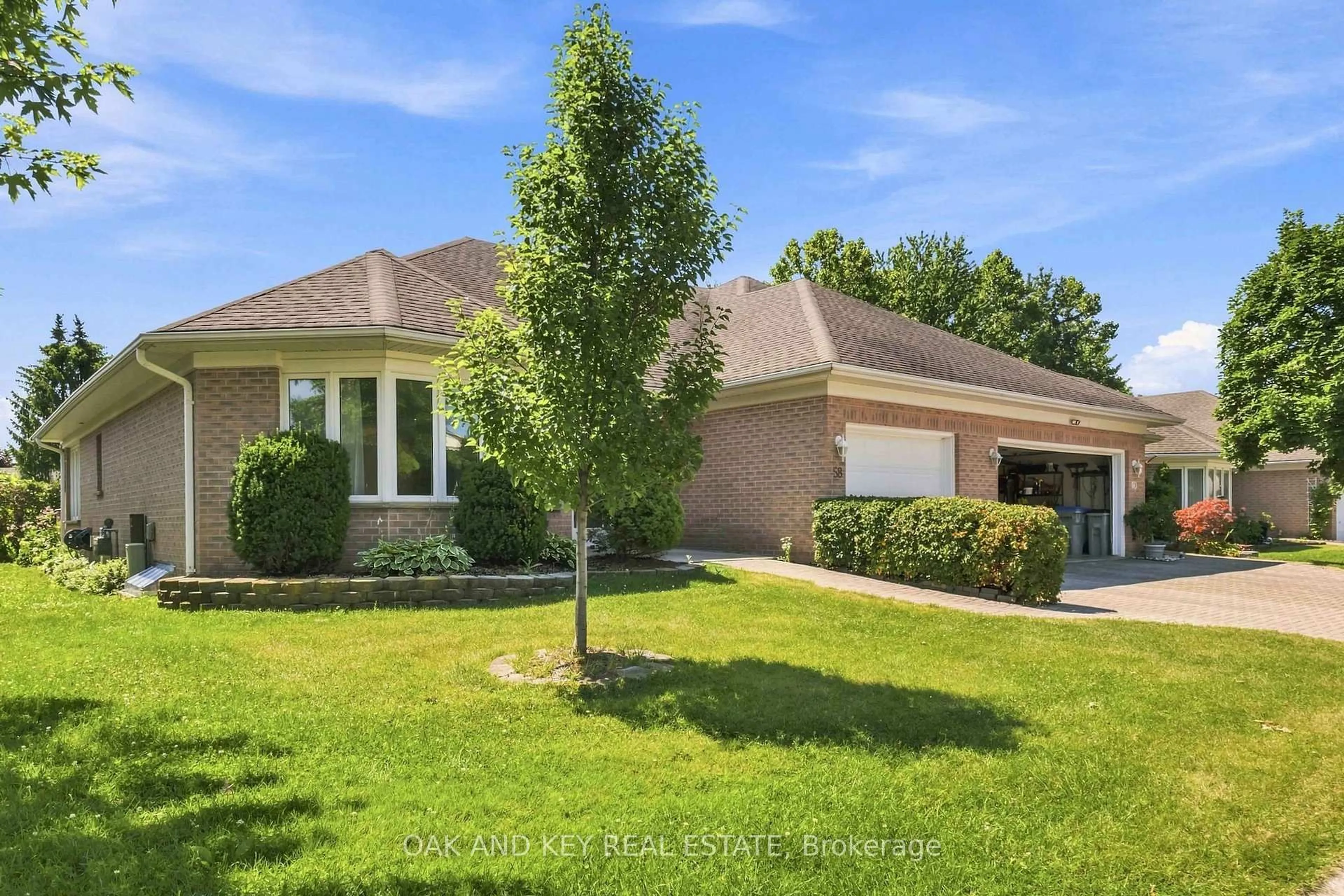 Home with brick exterior material, street for 58 Ilderbrook Circ, Middlesex Centre Ontario N0M 2A0