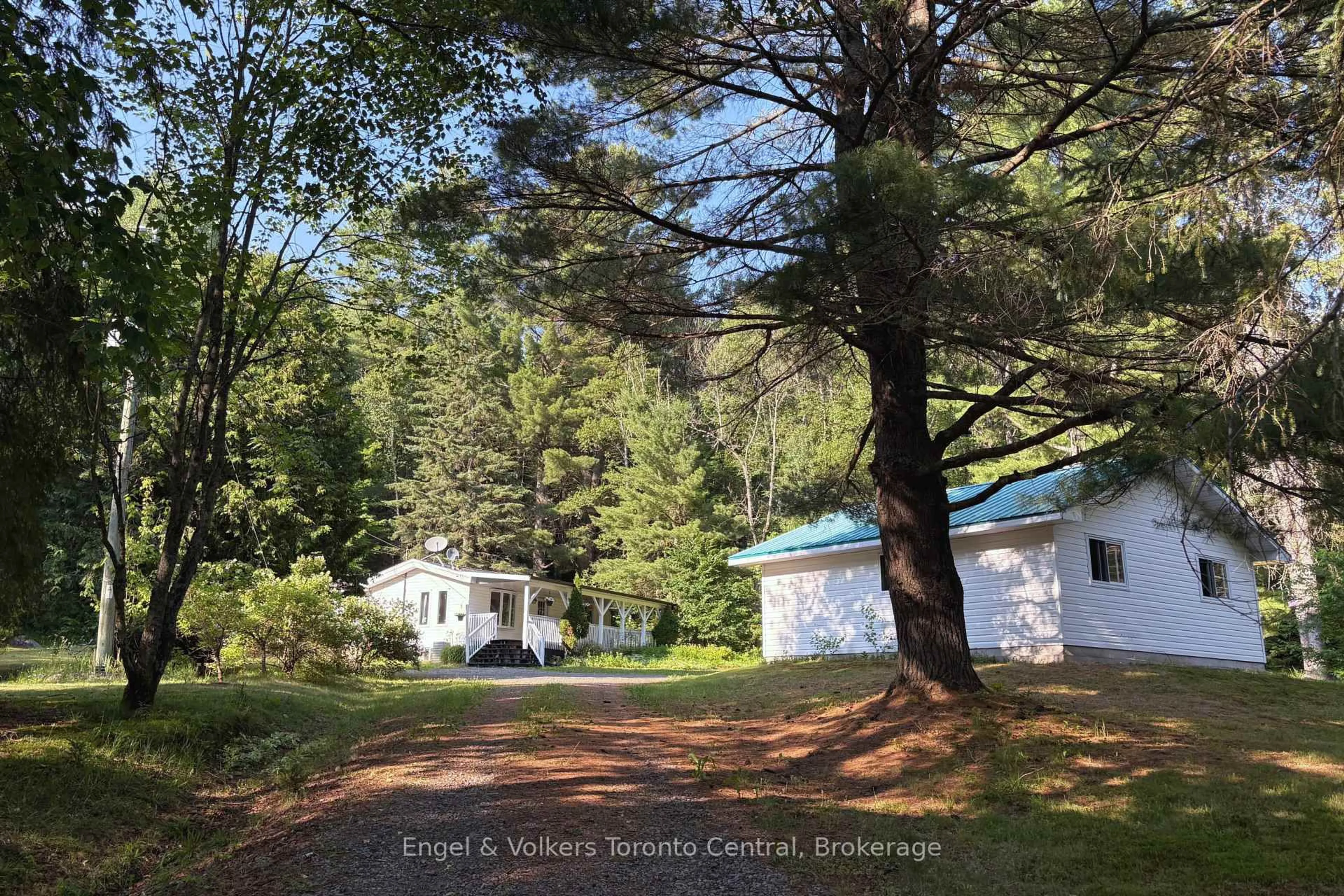 A pic from outside/outdoor area/front of a property/back of a property/a pic from drone, forest/trees view for 83 Homeland Dr, Perry Ontario P0A 1J0