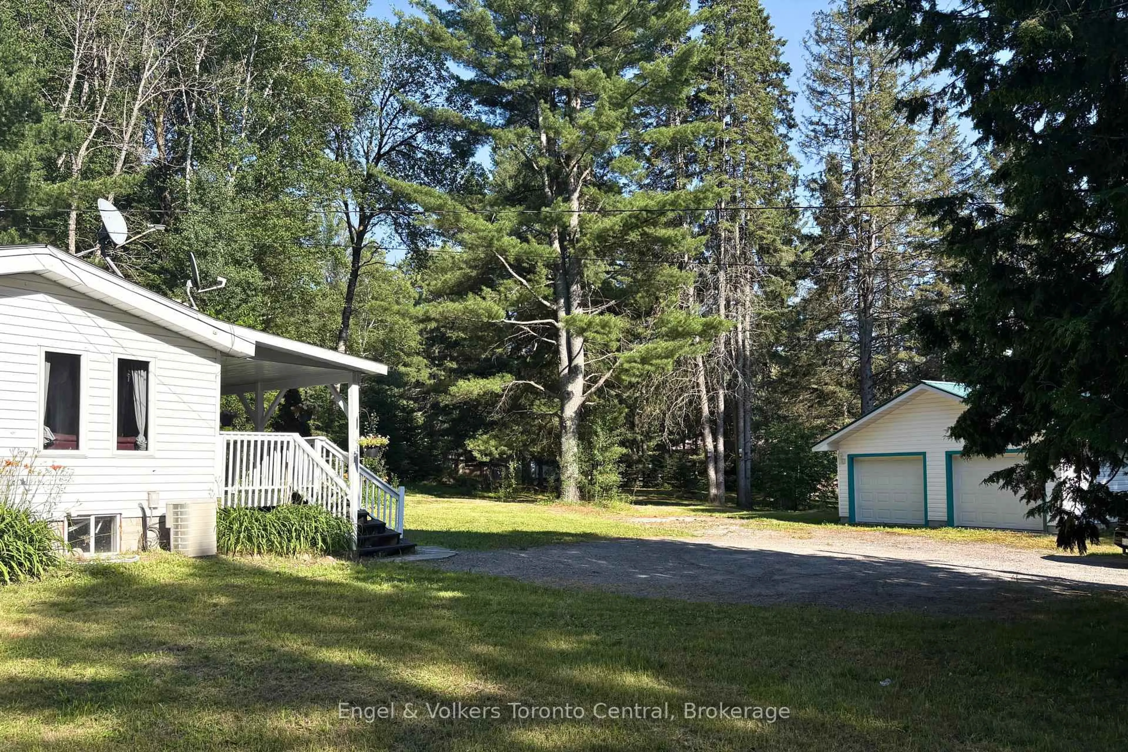 A pic from outside/outdoor area/front of a property/back of a property/a pic from drone, forest/trees view for 83 Homeland Dr, Perry Ontario P0A 1J0