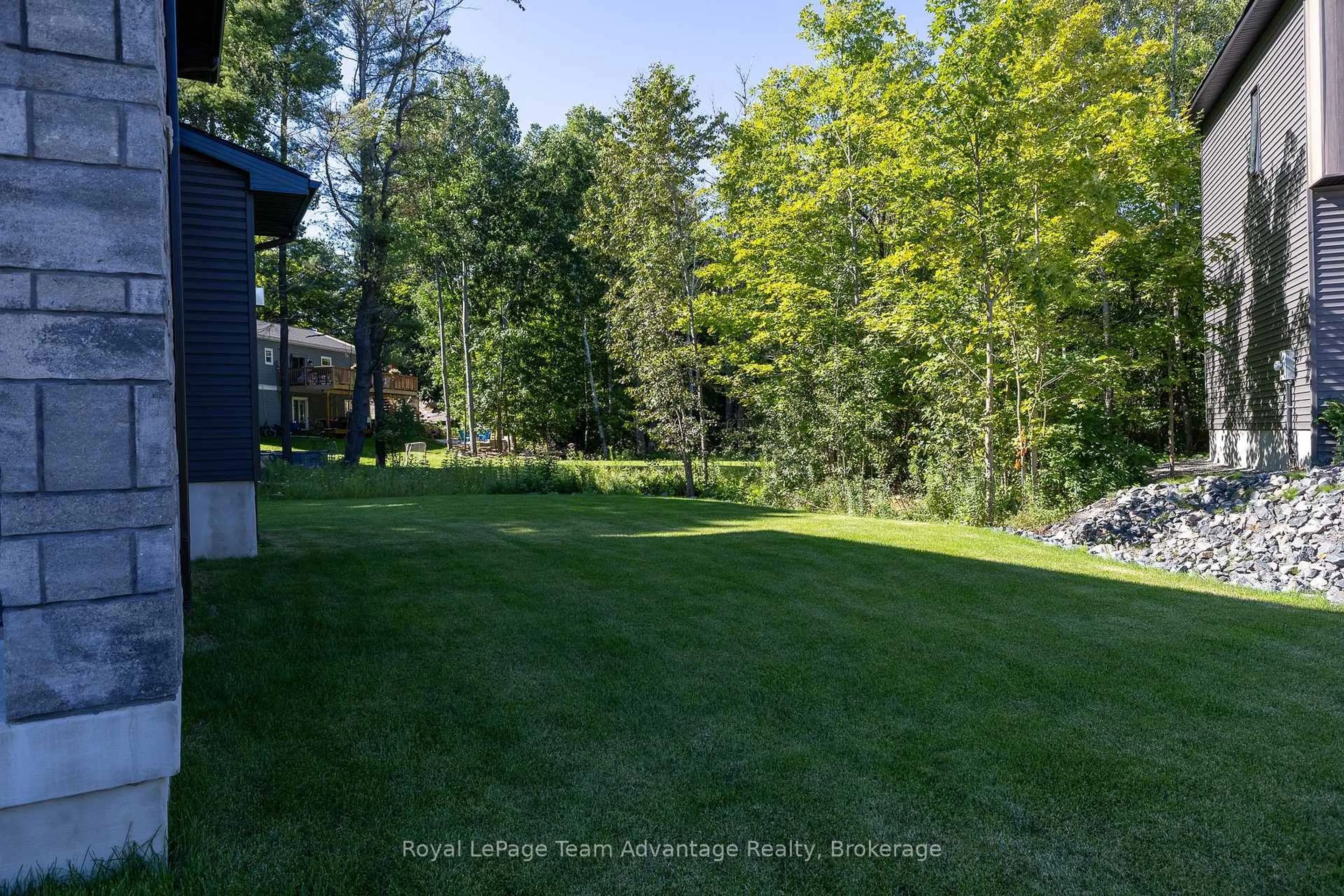 Patio, forest/trees view for 53 Dennis Dr, Parry Sound Ontario P2A 0E4