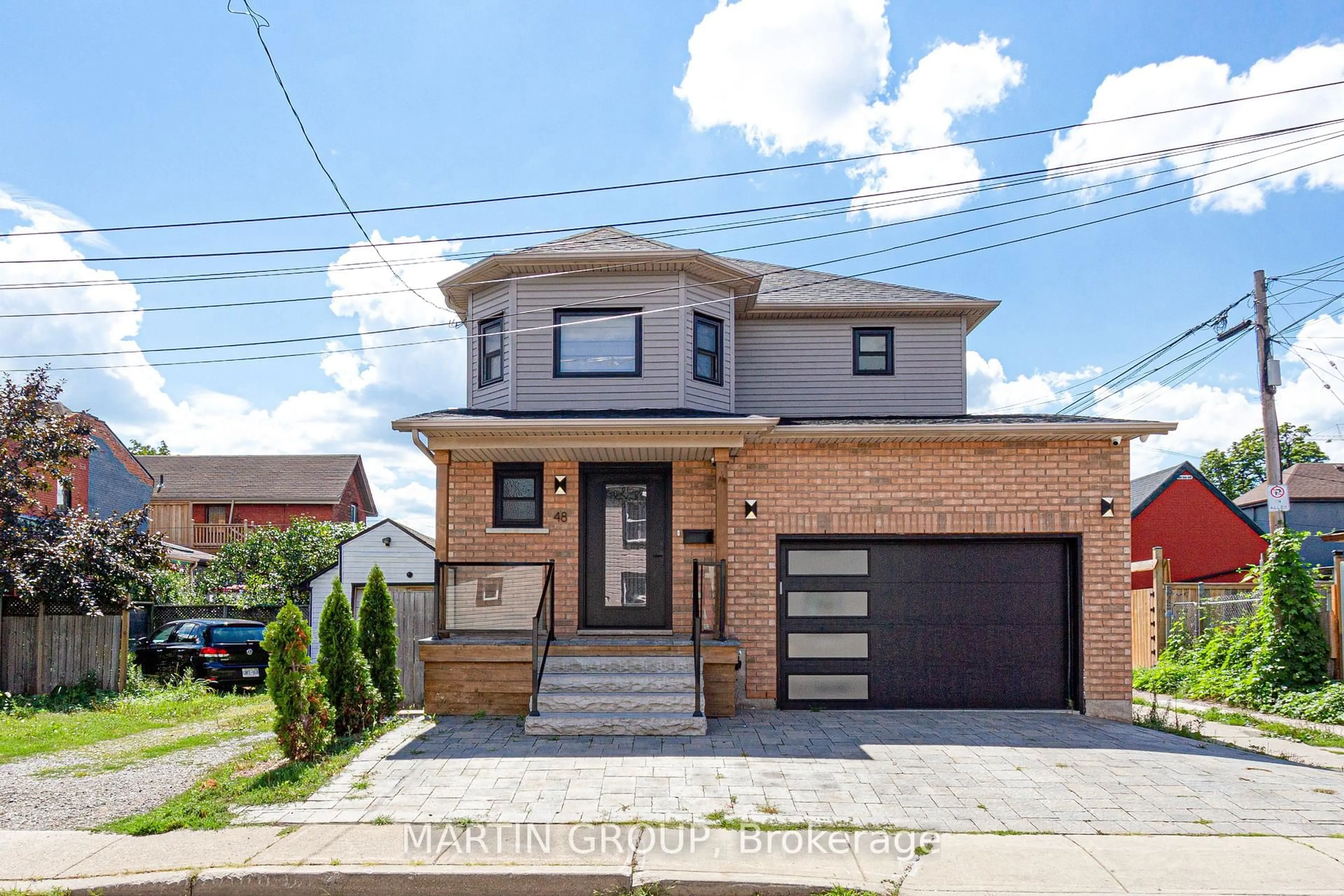 Home with brick exterior material, street for 48 Evans St, Hamilton Ontario L8L 1W3
