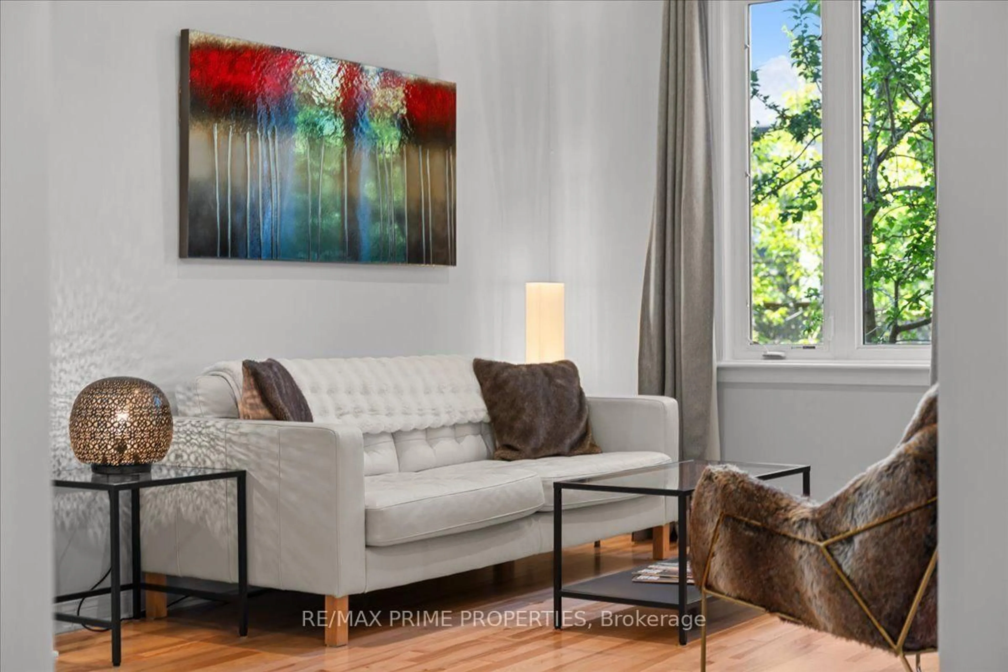 Living room with furniture, wood/laminate floor for 1962 Plainhill Dr, Ottawa Ontario K4A 0G1