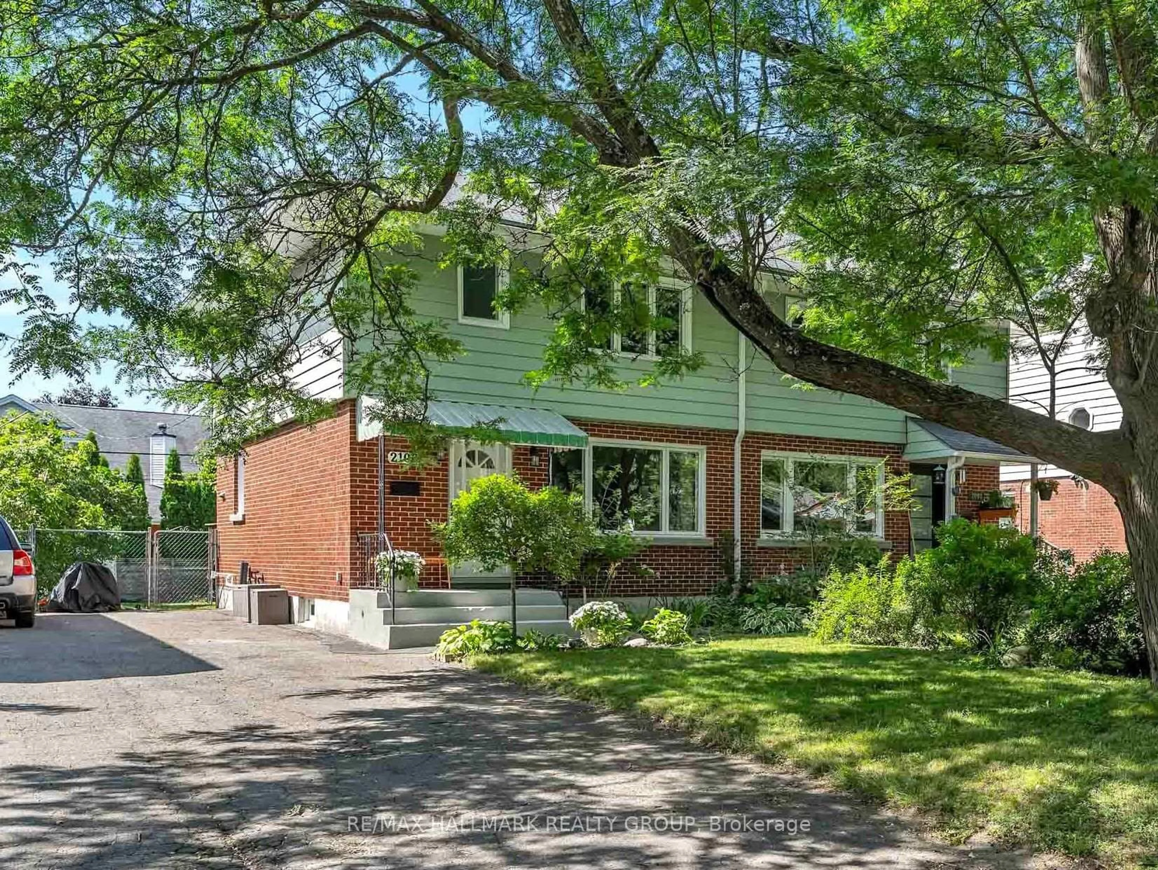 Home with brick exterior material, street for 2100 Blossom Dr, Ottawa Ontario K1H 6G8
