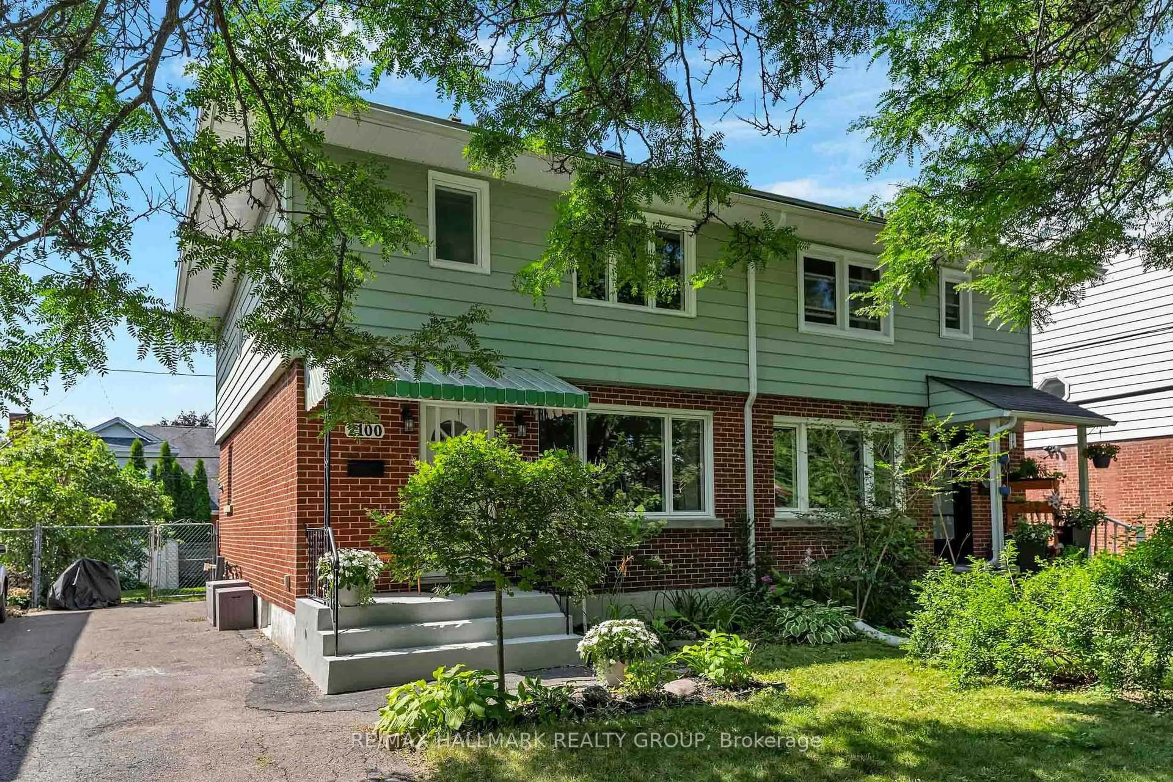 Home with brick exterior material, street for 2100 Blossom Dr, Ottawa Ontario K1H 6G8