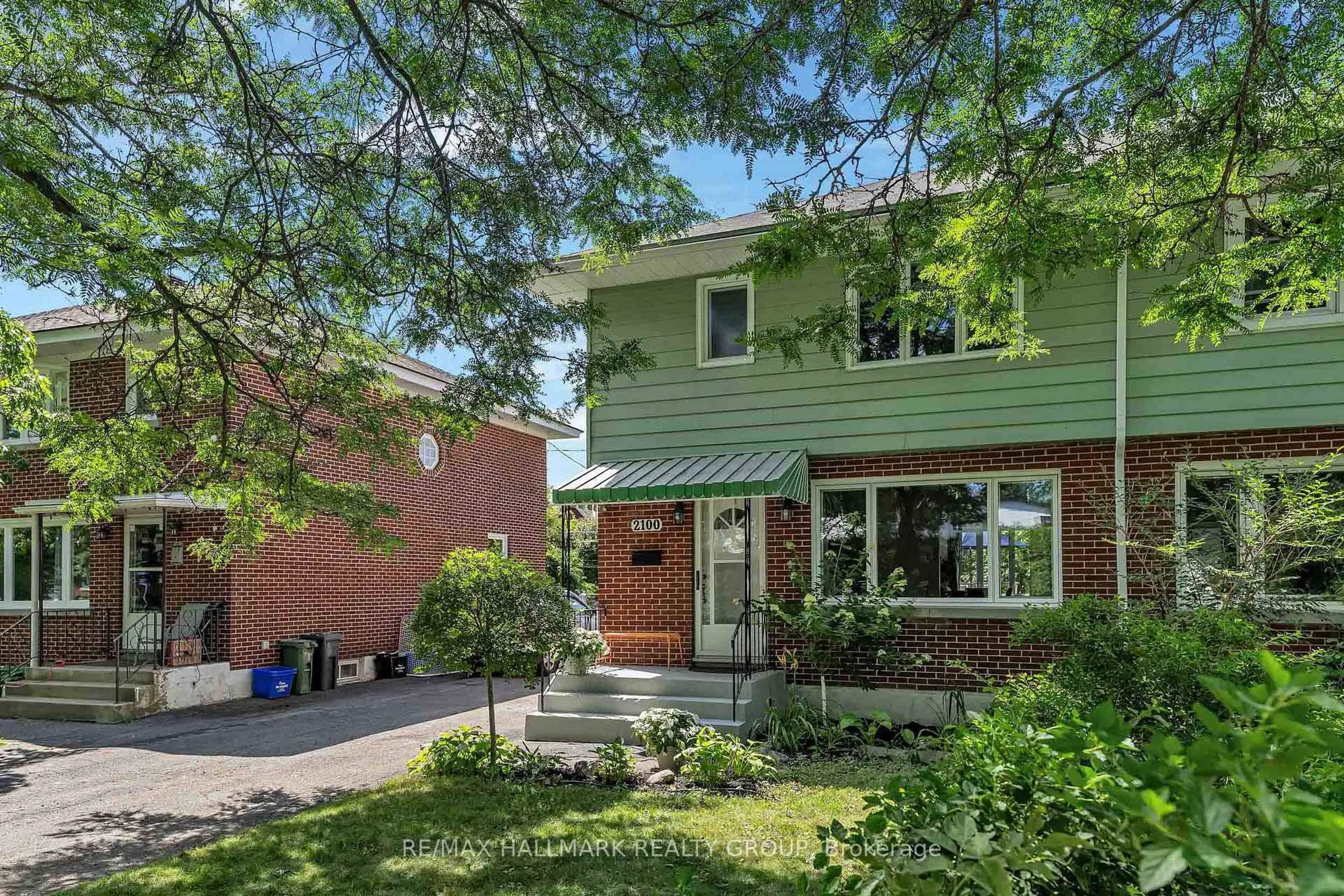 Home with brick exterior material, street for 2100 Blossom Dr, Ottawa Ontario K1H 6G8