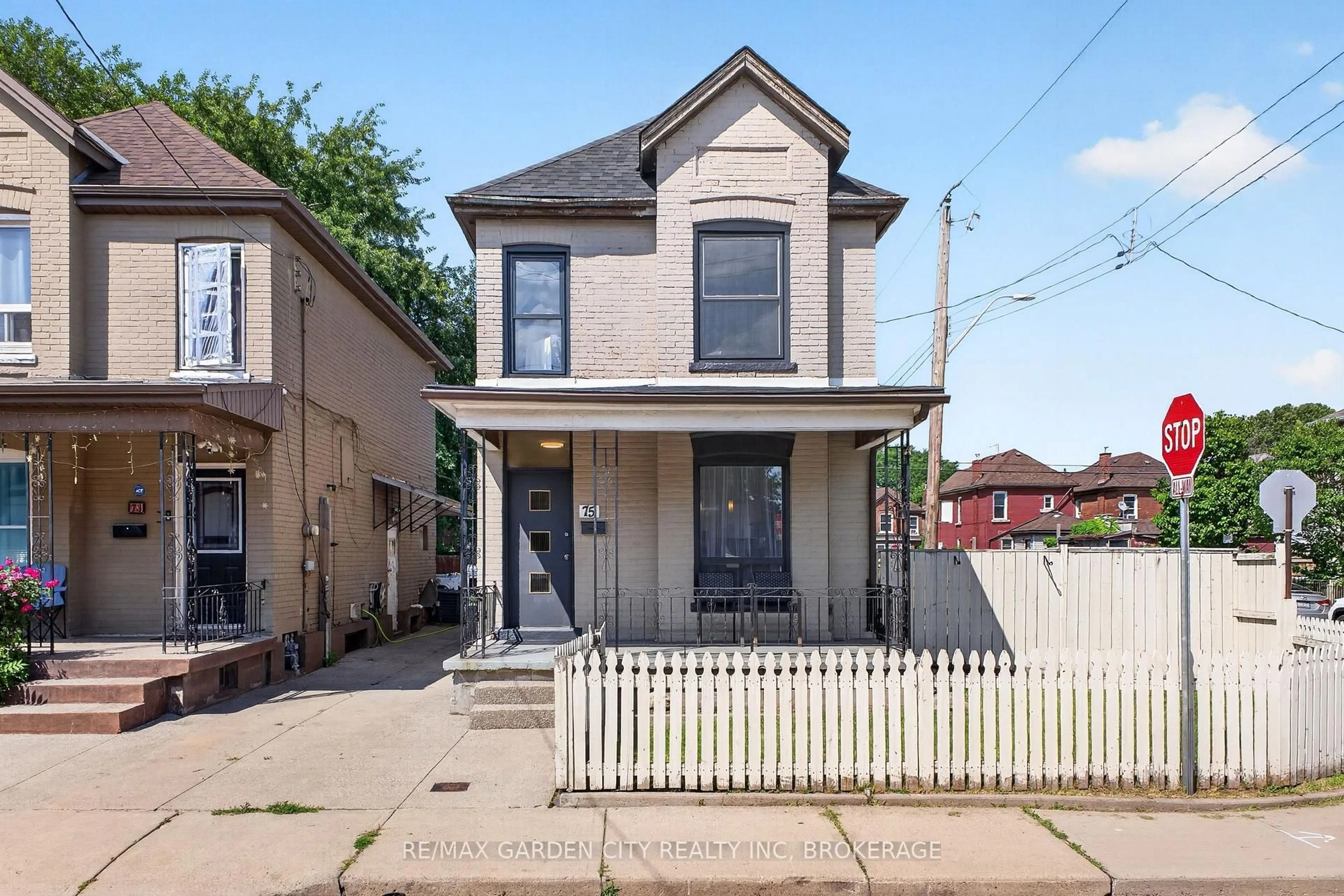 Home with brick exterior material, street for 75 Keith St, Hamilton Ontario L8L 3S2