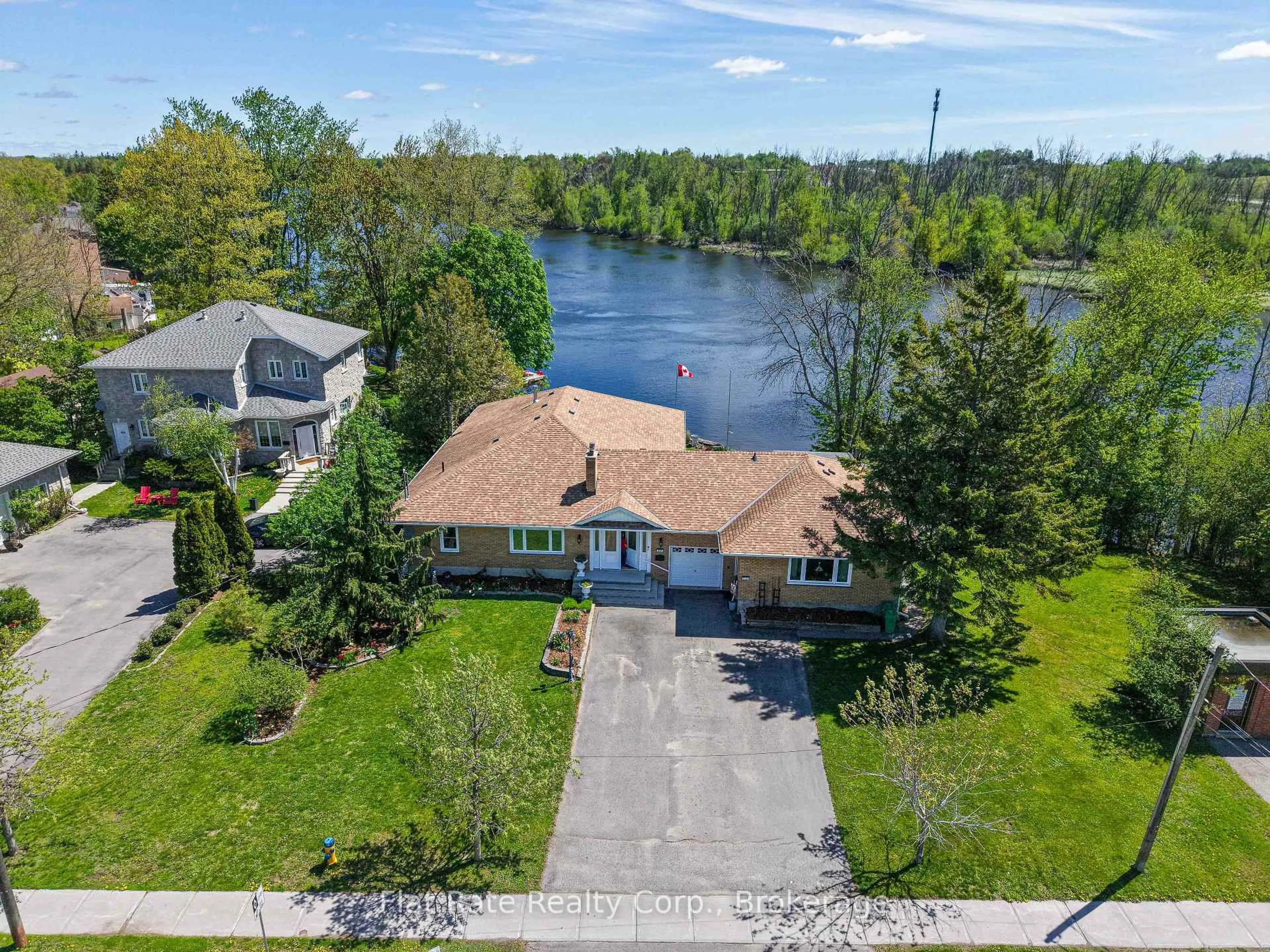 A pic from outside/outdoor area/front of a property/back of a property/a pic from drone, water/lake/river/ocean view for 510 Monaghan Rd, Peterborough Ontario K9J 5H5