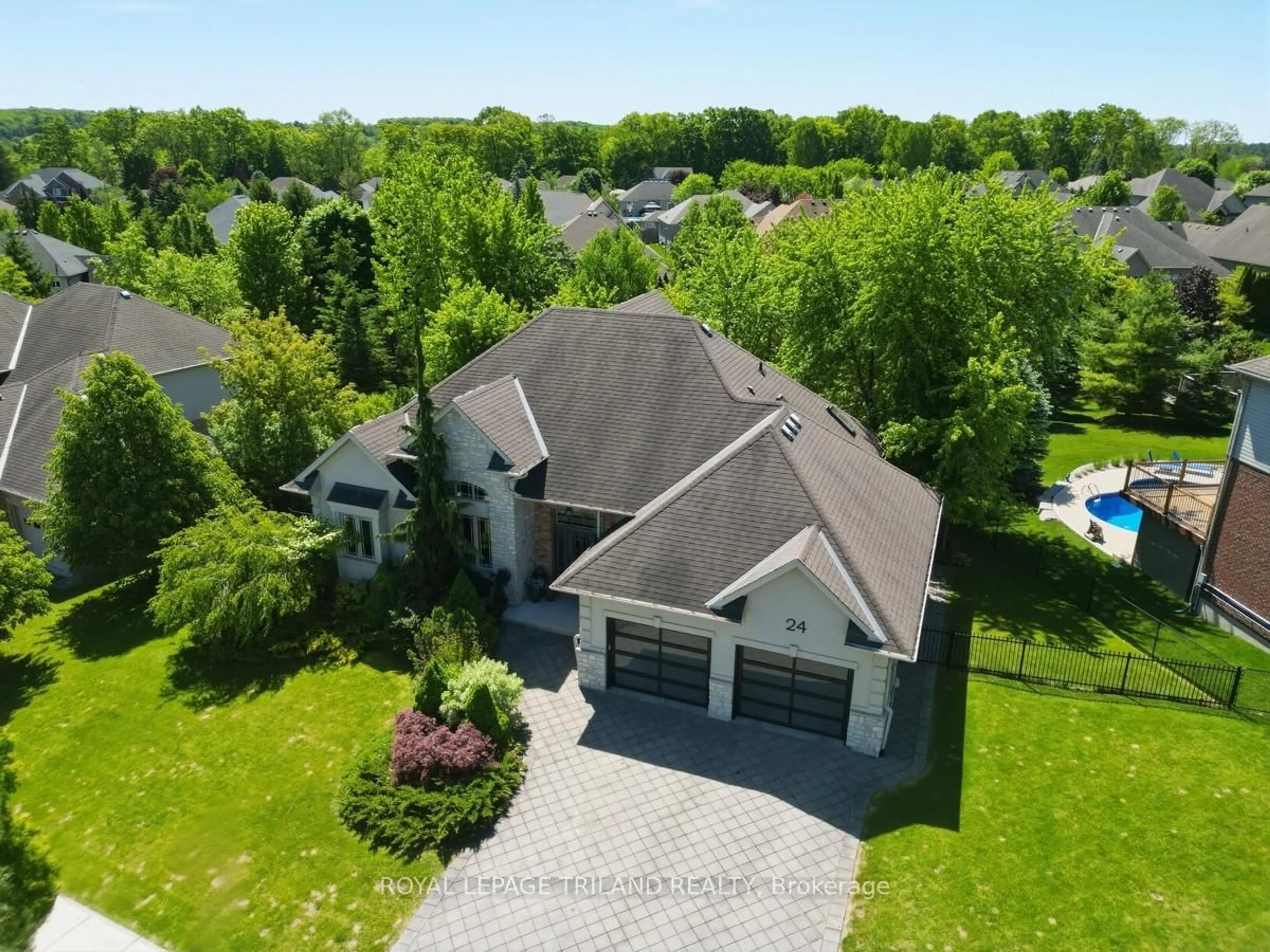 A pic from outside/outdoor area/front of a property/back of a property/a pic from drone, unknown for 24 Earlscourt Terr, Middlesex Centre Ontario N0L 1R0