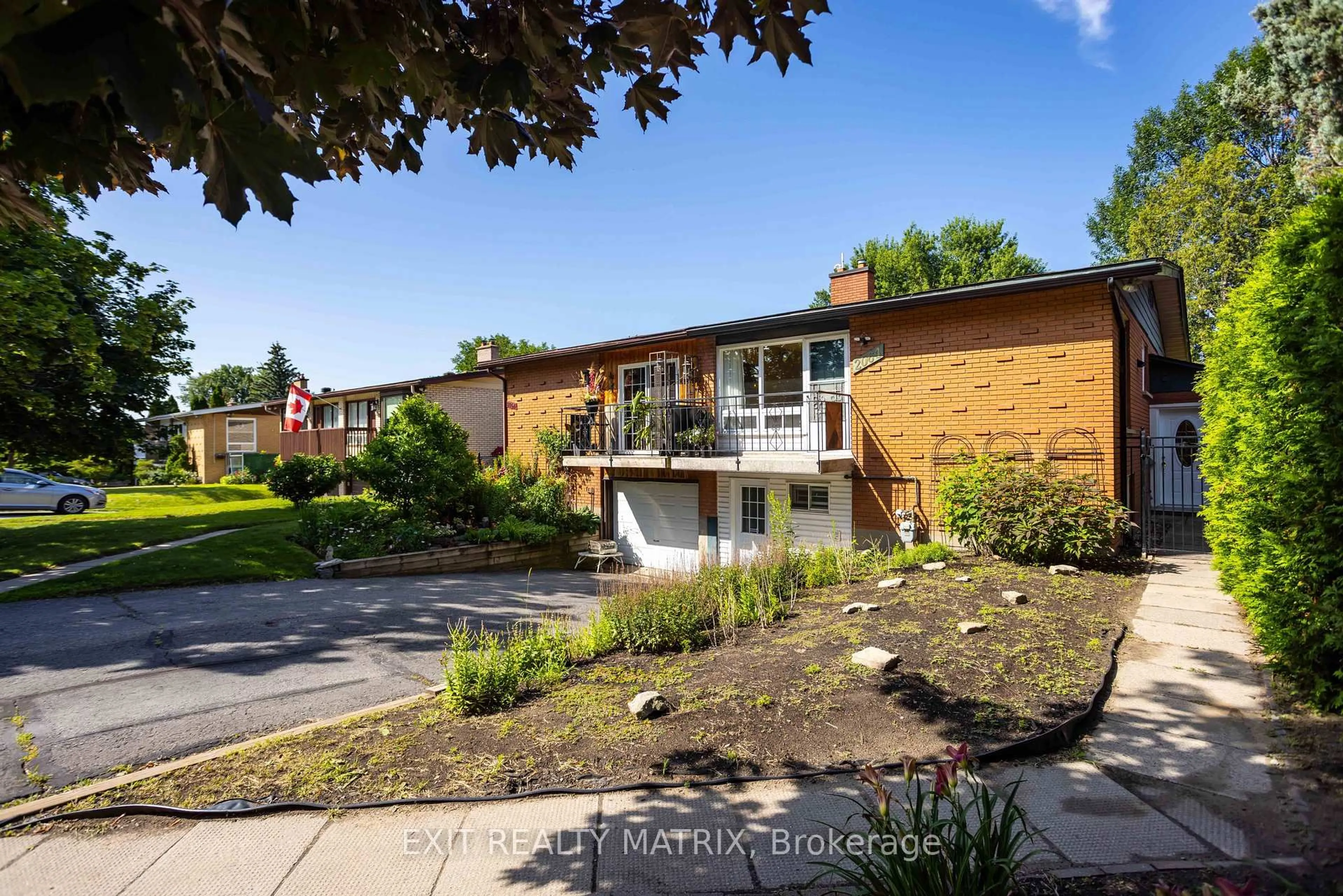 Home with brick exterior material, street for 2064 St Laurent Blvd, Ottawa Ontario K1G 1A9