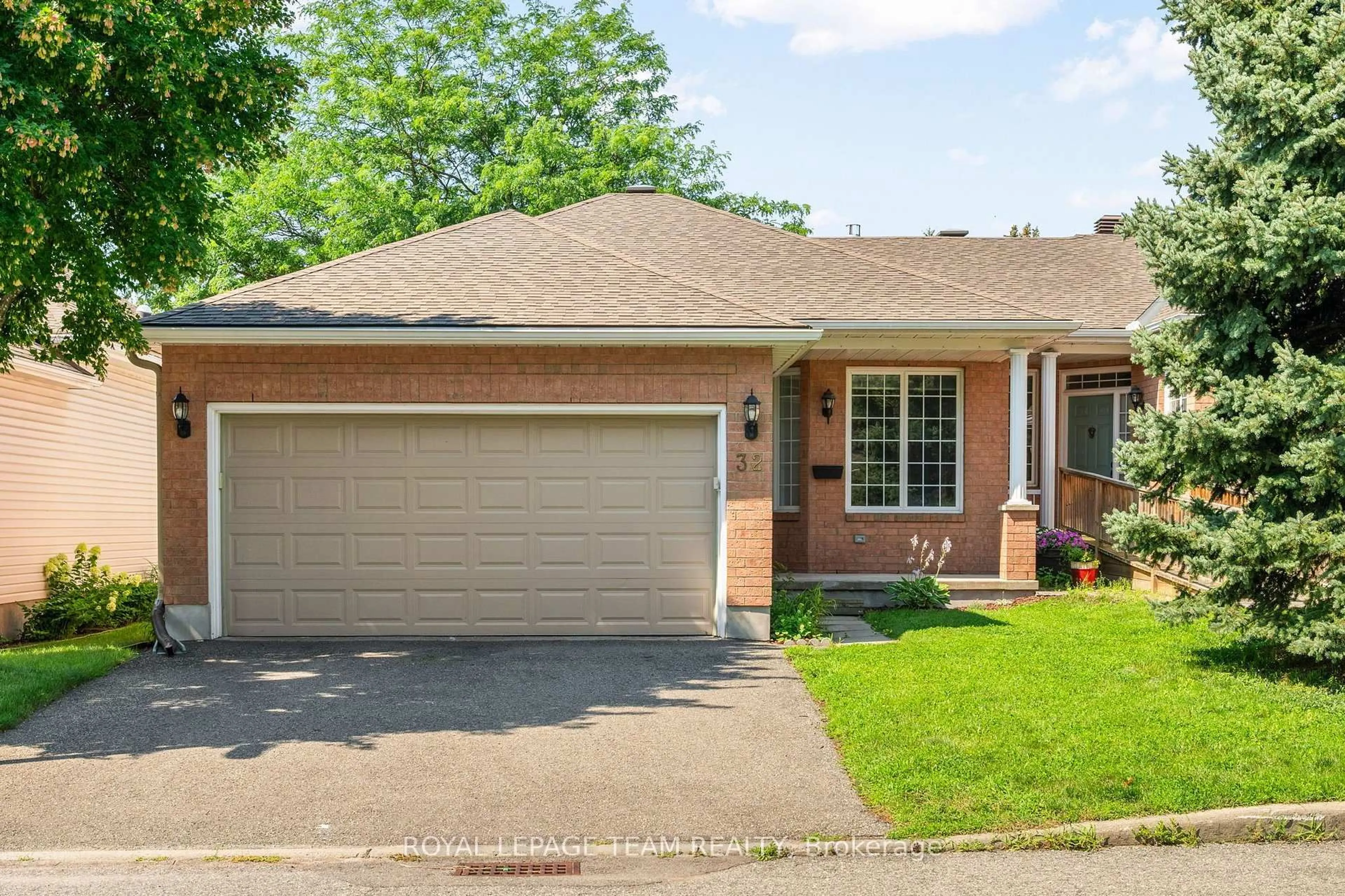Home with brick exterior material, street for 32 Trump Ave, Ottawa Ontario K2C 4A7