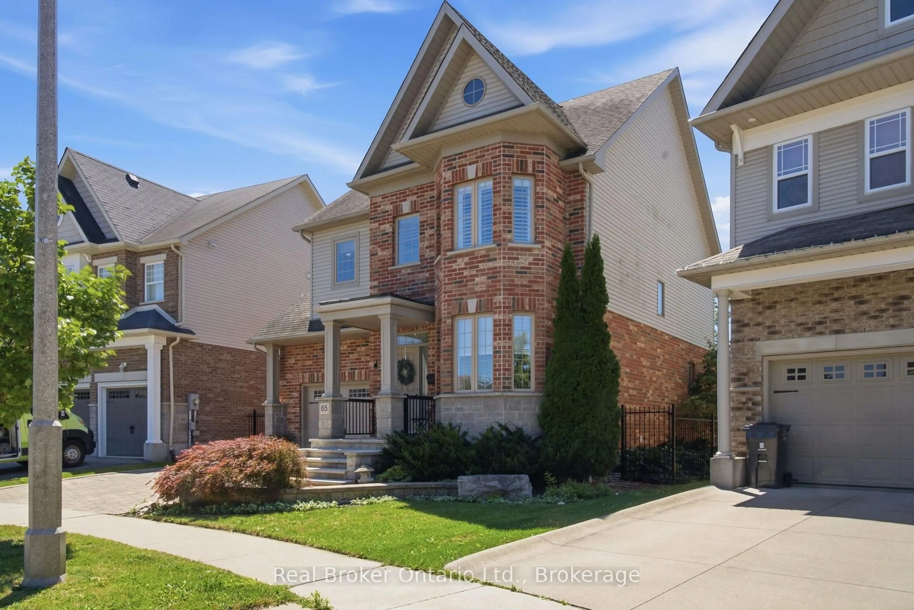 Home with brick exterior material, street for 65 Amsterdam Cres, Guelph Ontario N1L 0G2