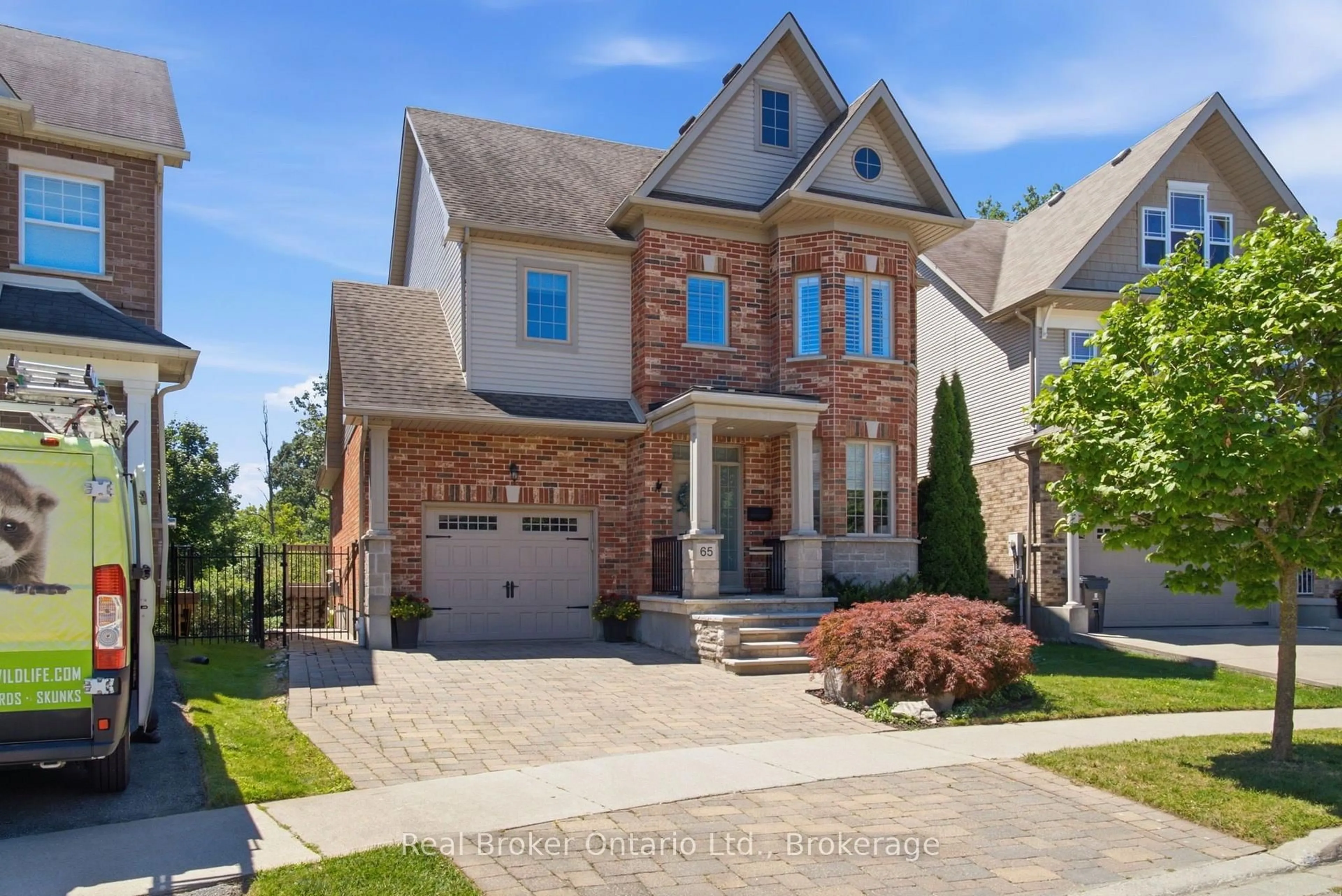 Home with brick exterior material, street for 65 Amsterdam Cres, Guelph Ontario N1L 0G2