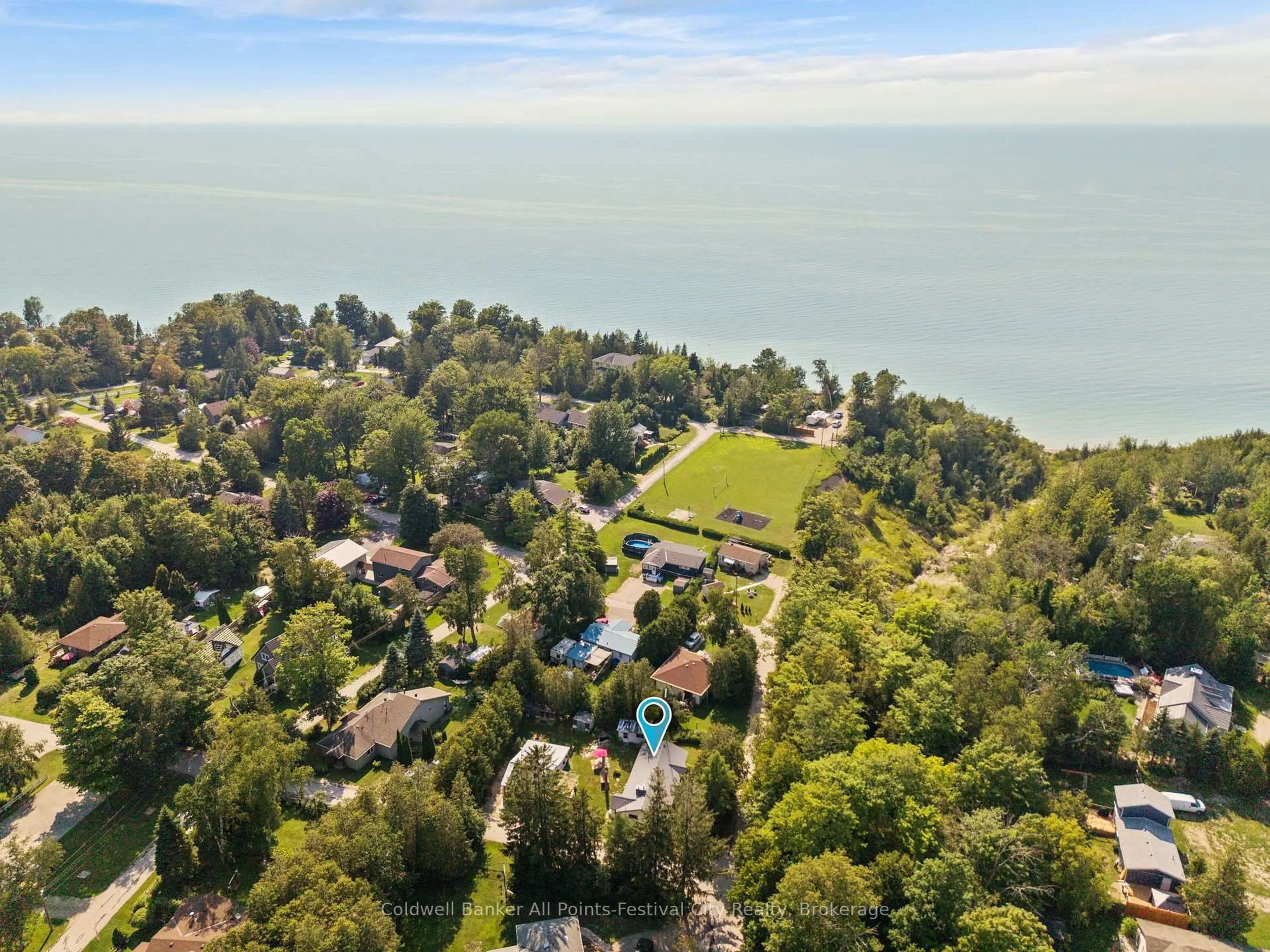 A pic from outside/outdoor area/front of a property/back of a property/a pic from drone, water/lake/river/ocean view for 31 Salkeld St, Central Huron Ontario N7A 3X8