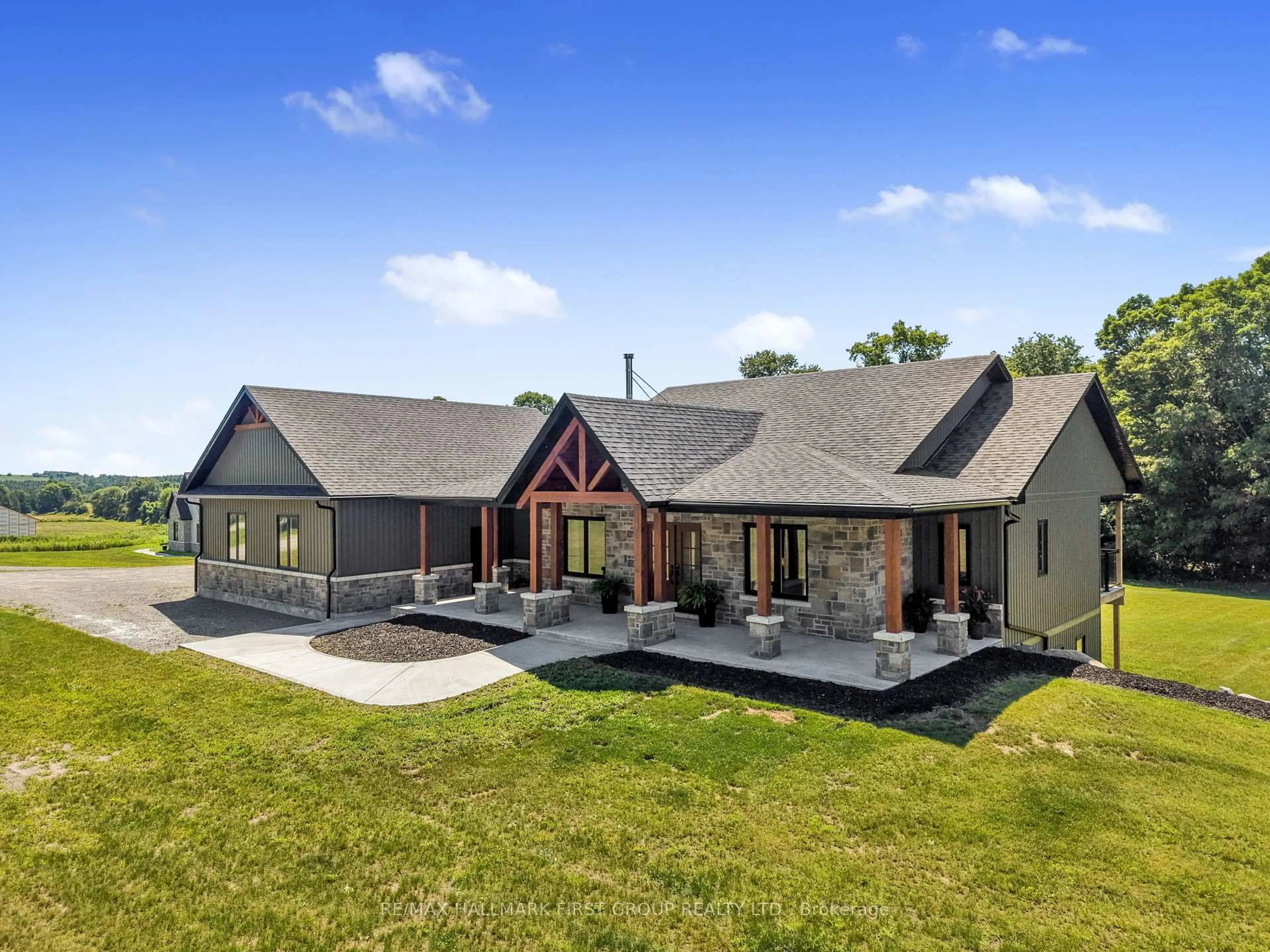 A pic from outside/outdoor area/front of a property/back of a property/a pic from drone, mountain view for 3922 Kennedy Rd, Hamilton Township Ontario K9A 4J7