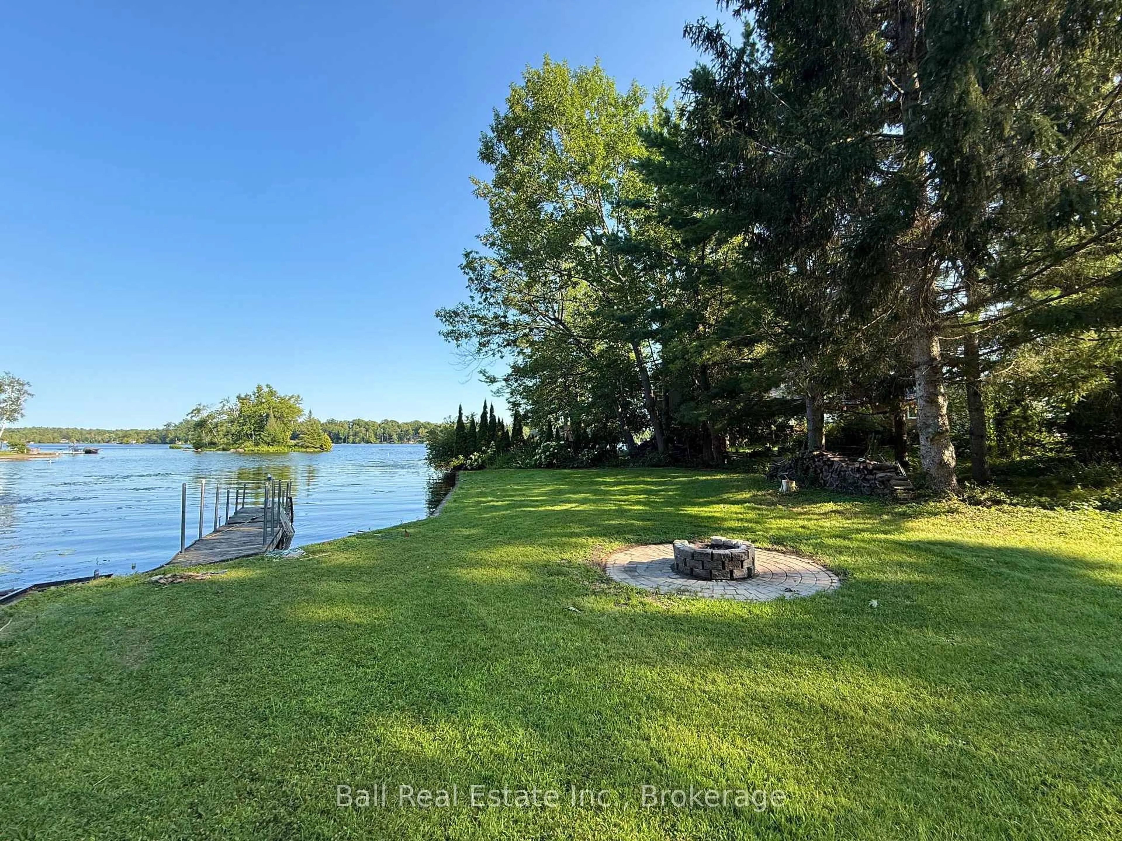 A pic from outside/outdoor area/front of a property/back of a property/a pic from drone, water/lake/river/ocean view for 116 Mystic Point Rd, Trent Lakes Ontario K0L 1J0