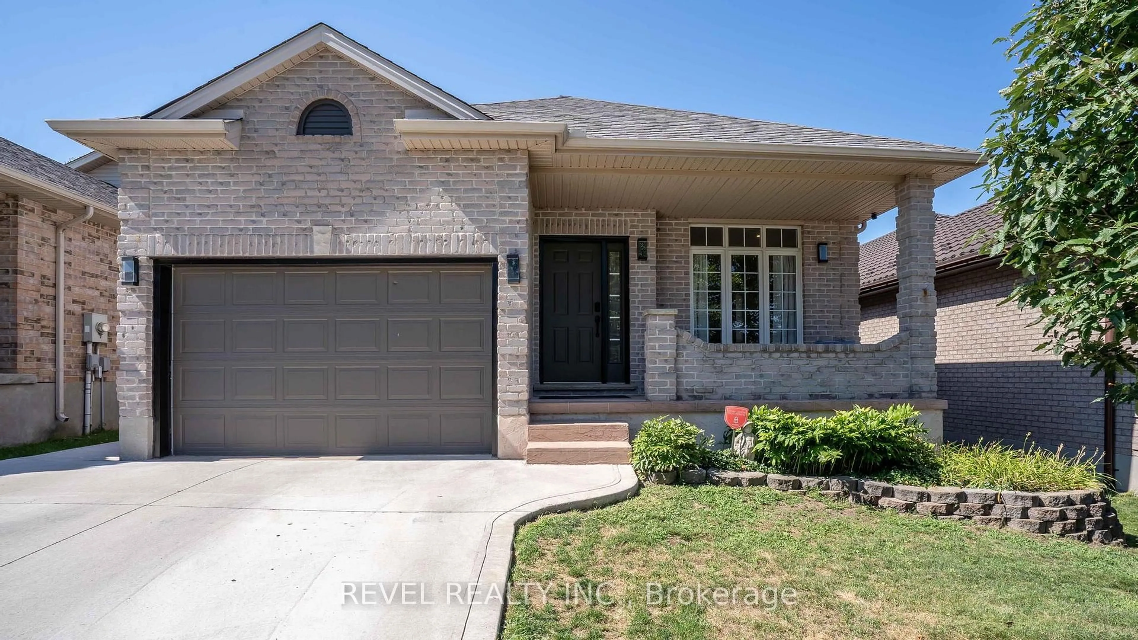 Home with brick exterior material, street for 857 CRESTHAVEN Cres, London South Ontario N6K 4W4