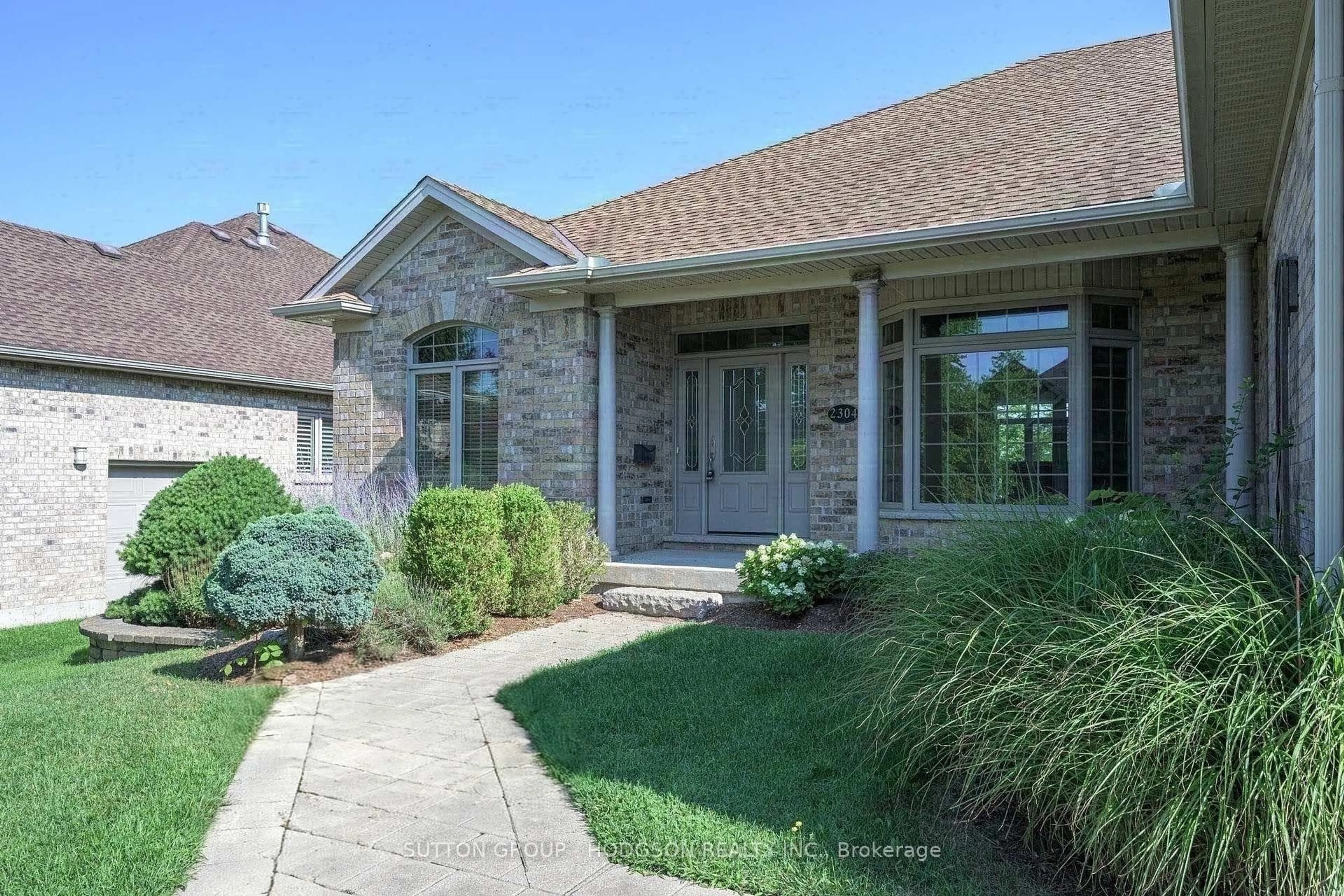 Home with brick exterior material, street for 2304 Jack Nash Dr, London South Ontario N6K 5R3