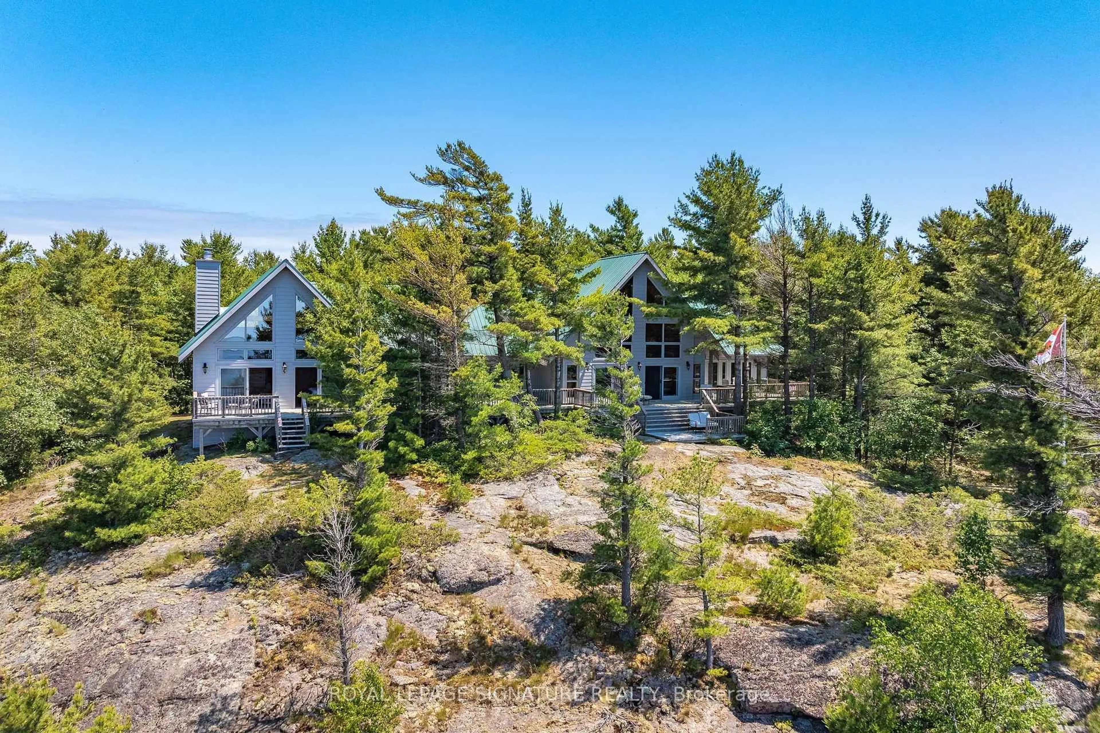 A pic from outside/outdoor area/front of a property/back of a property/a pic from drone, forest/trees view for B350 Echo Island, The Archipelago Ontario P2A 0A1