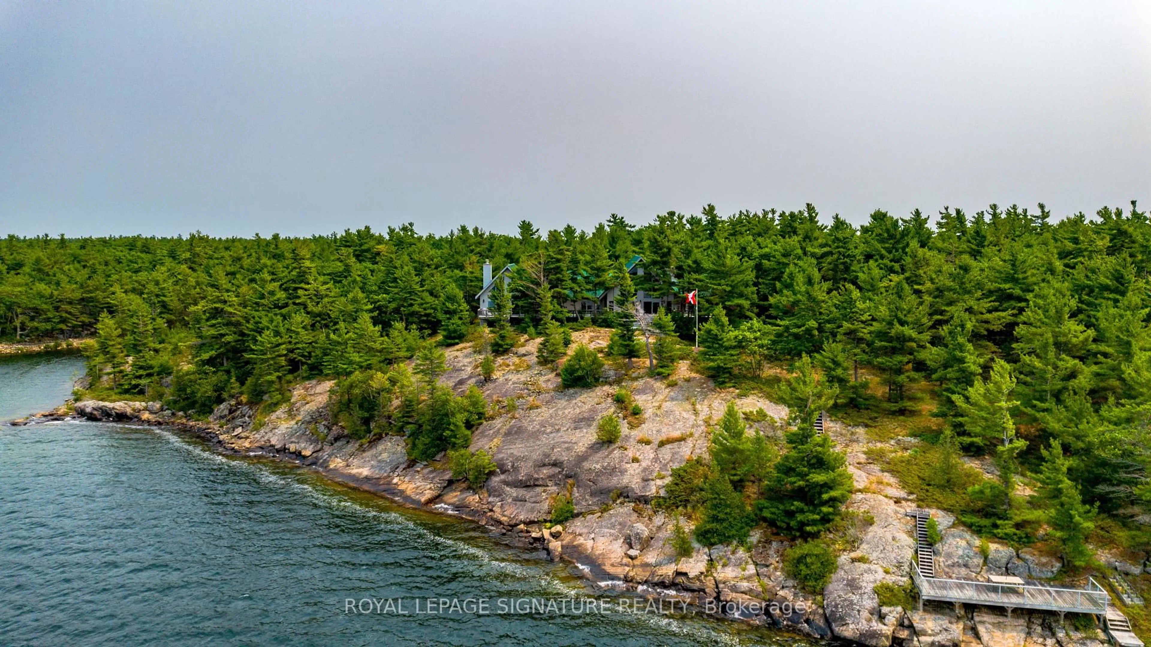 A pic from outside/outdoor area/front of a property/back of a property/a pic from drone, water/lake/river/ocean view for B350 Echo Island, The Archipelago Ontario P2A 0A1