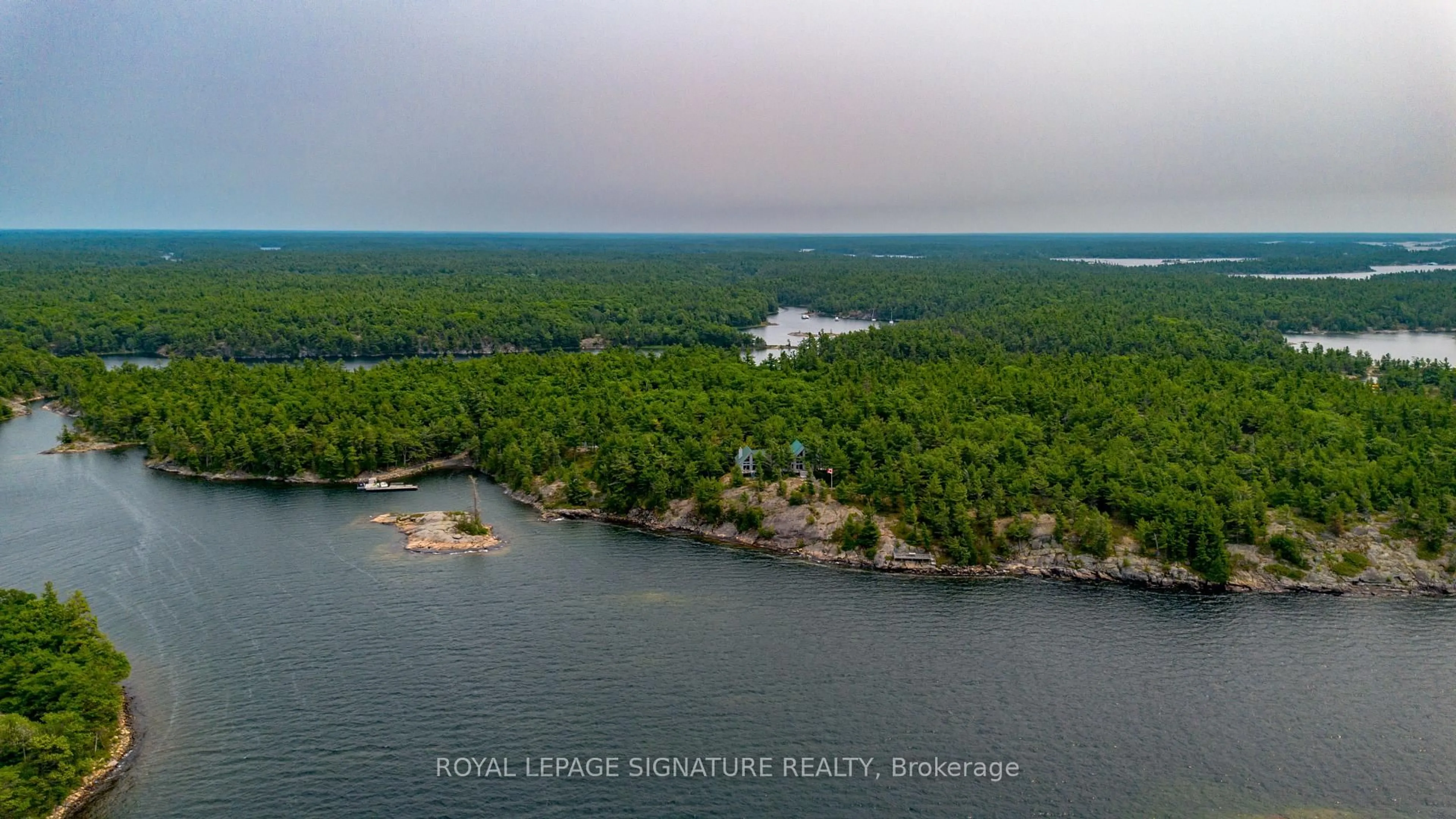 A pic from outside/outdoor area/front of a property/back of a property/a pic from drone, water/lake/river/ocean view for B350 Echo Island, The Archipelago Ontario P2A 0A1