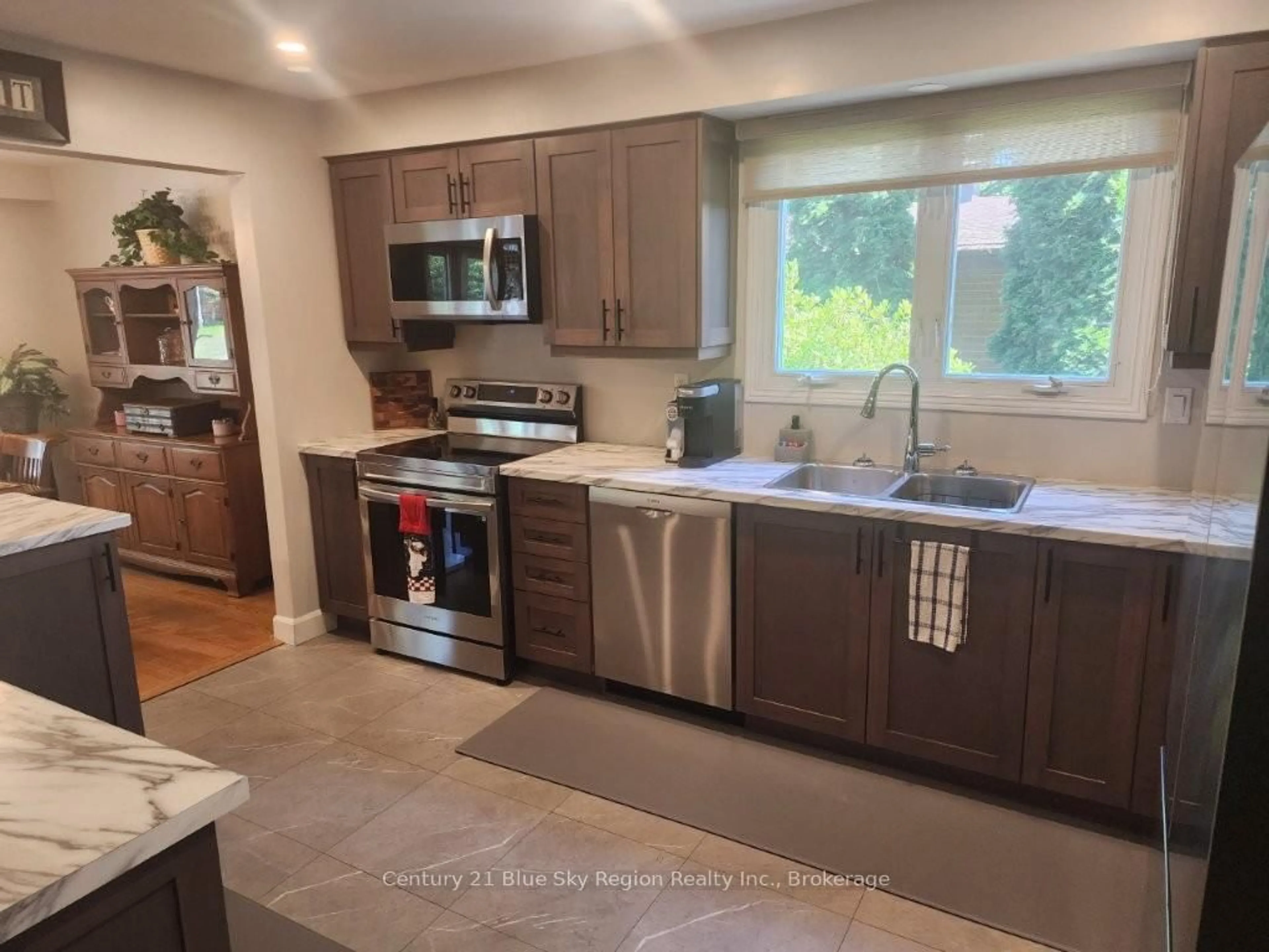 Open concept kitchen, ceramic/tile floor for 14 Birch St, North Bay Ontario P1A 1R8